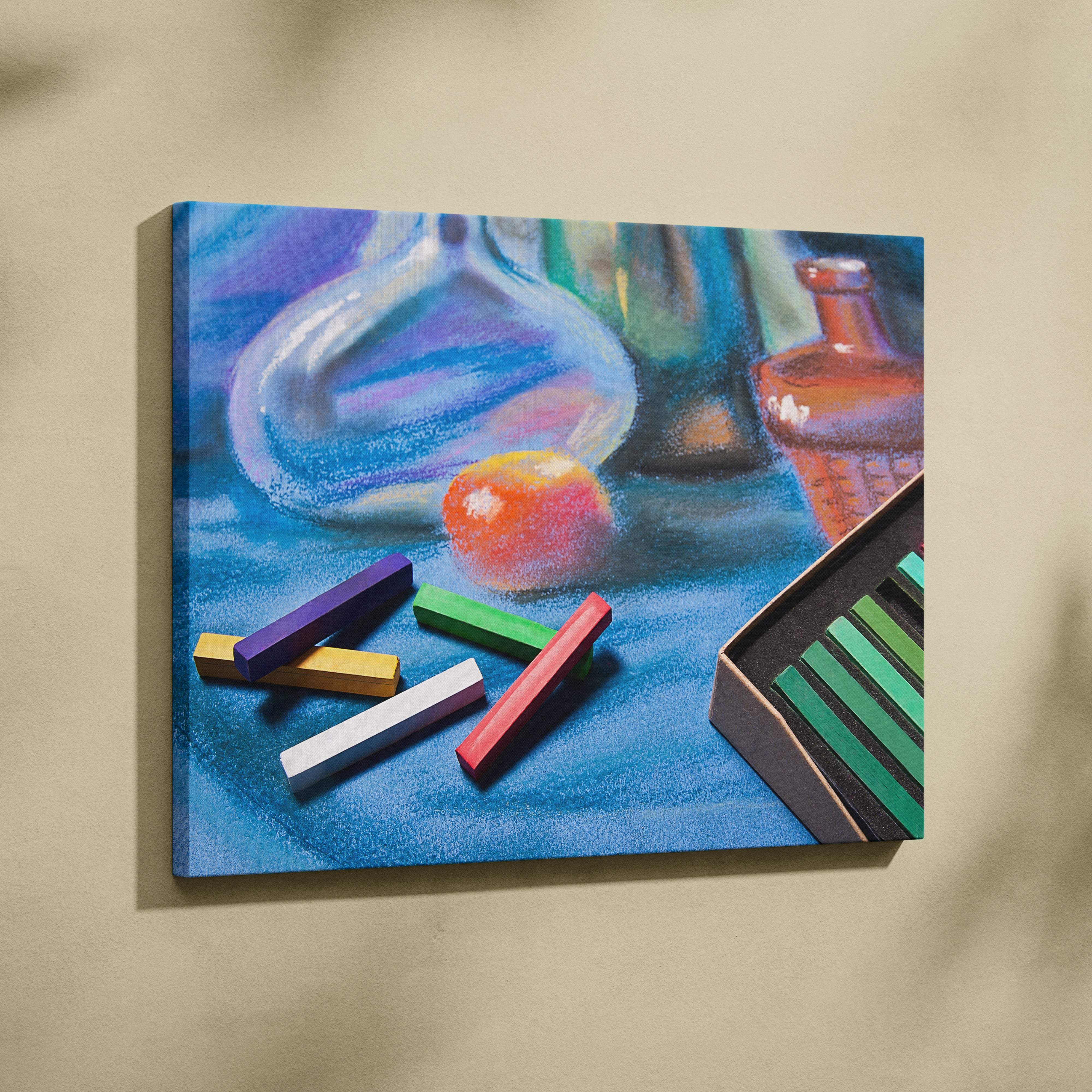 A vibrant blue canvas print featuring pastel chalks glassware and an orange in a soft still life painting style