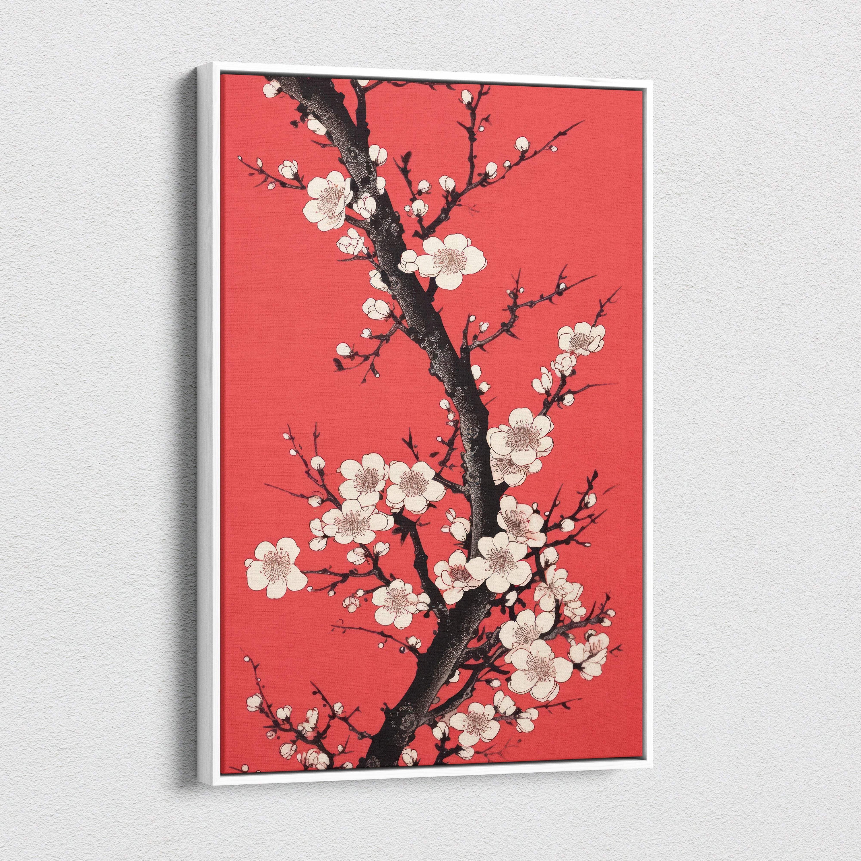 A framed red floral blossom canvas wall art with white cherry flowers and black branches in modern asian ink style