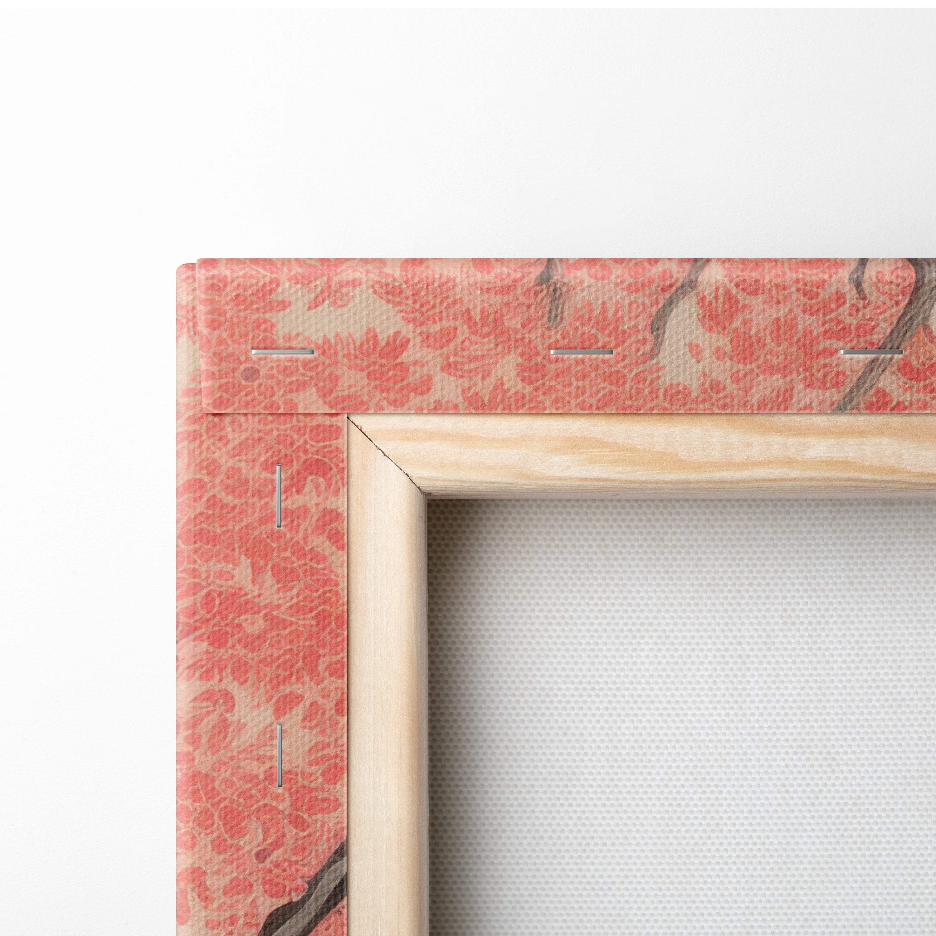 A wooden canvas frame with a pink floral patterned border and stitching for coral willow lake canvas wall art