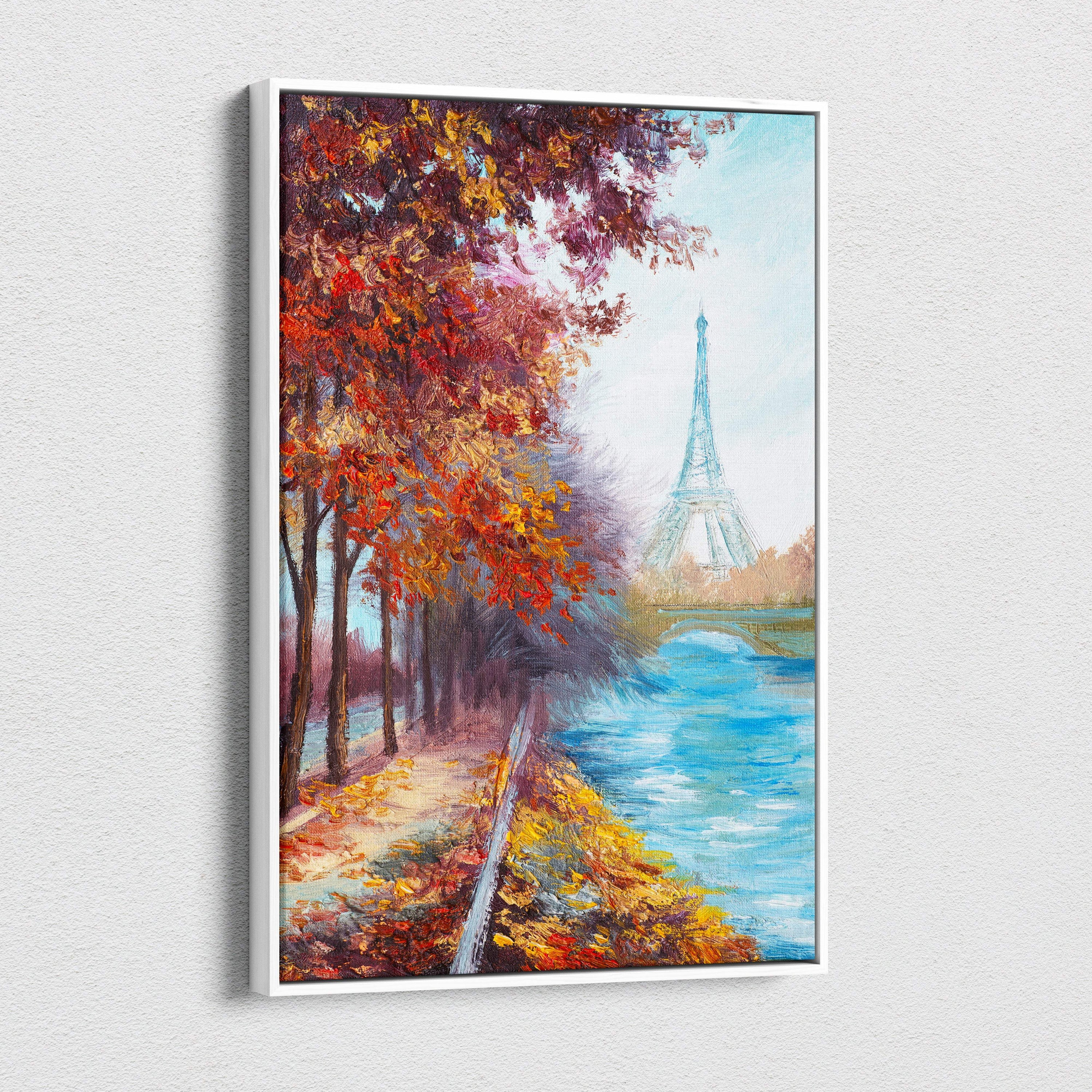 A framed canvas print of a vibrant autumn Paris landscape with warm red and gold trees by the riverbank and Eiffel Tower