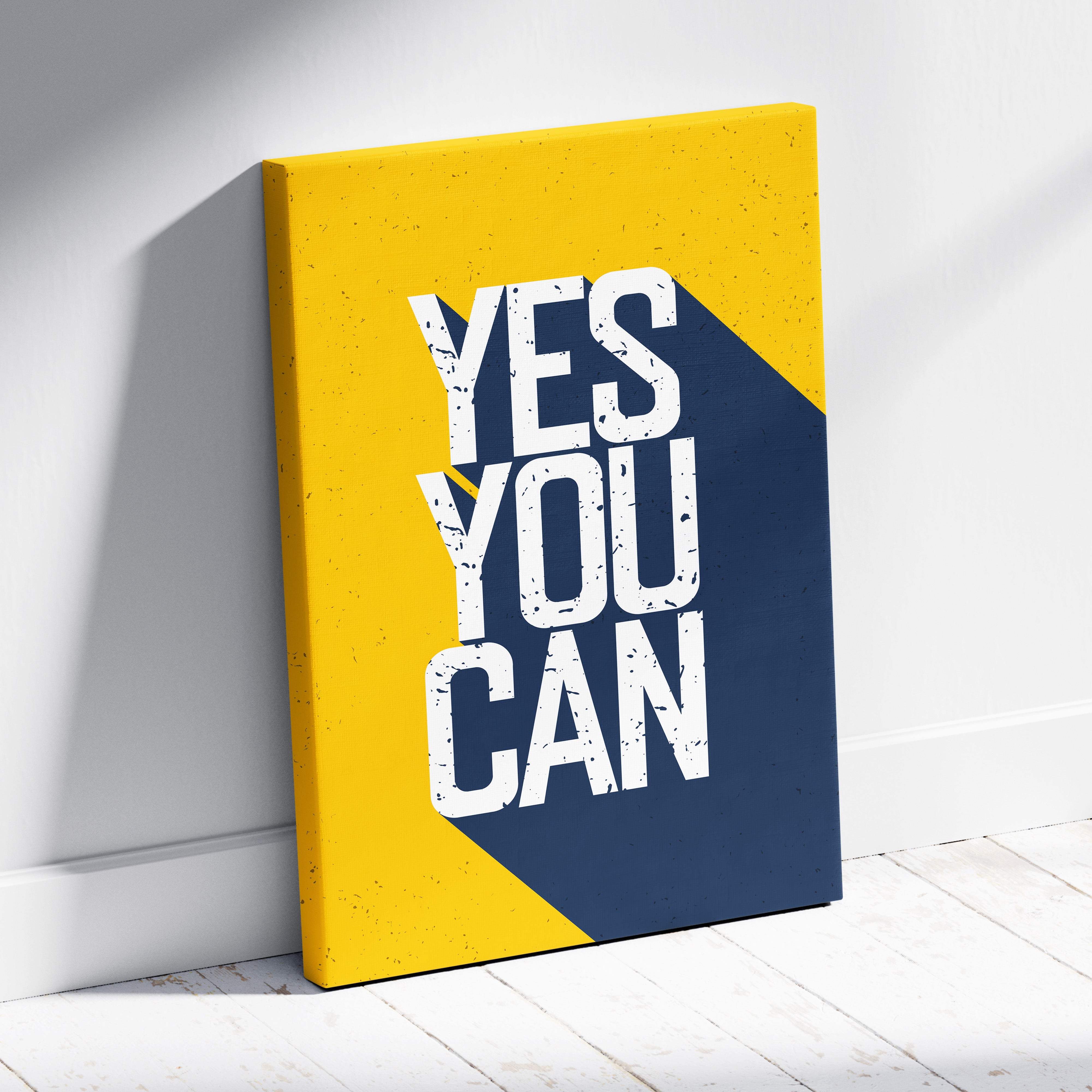 A vibrant yellow and navy blue canvas print featuring motivational yes you can typography for office gym or home decor