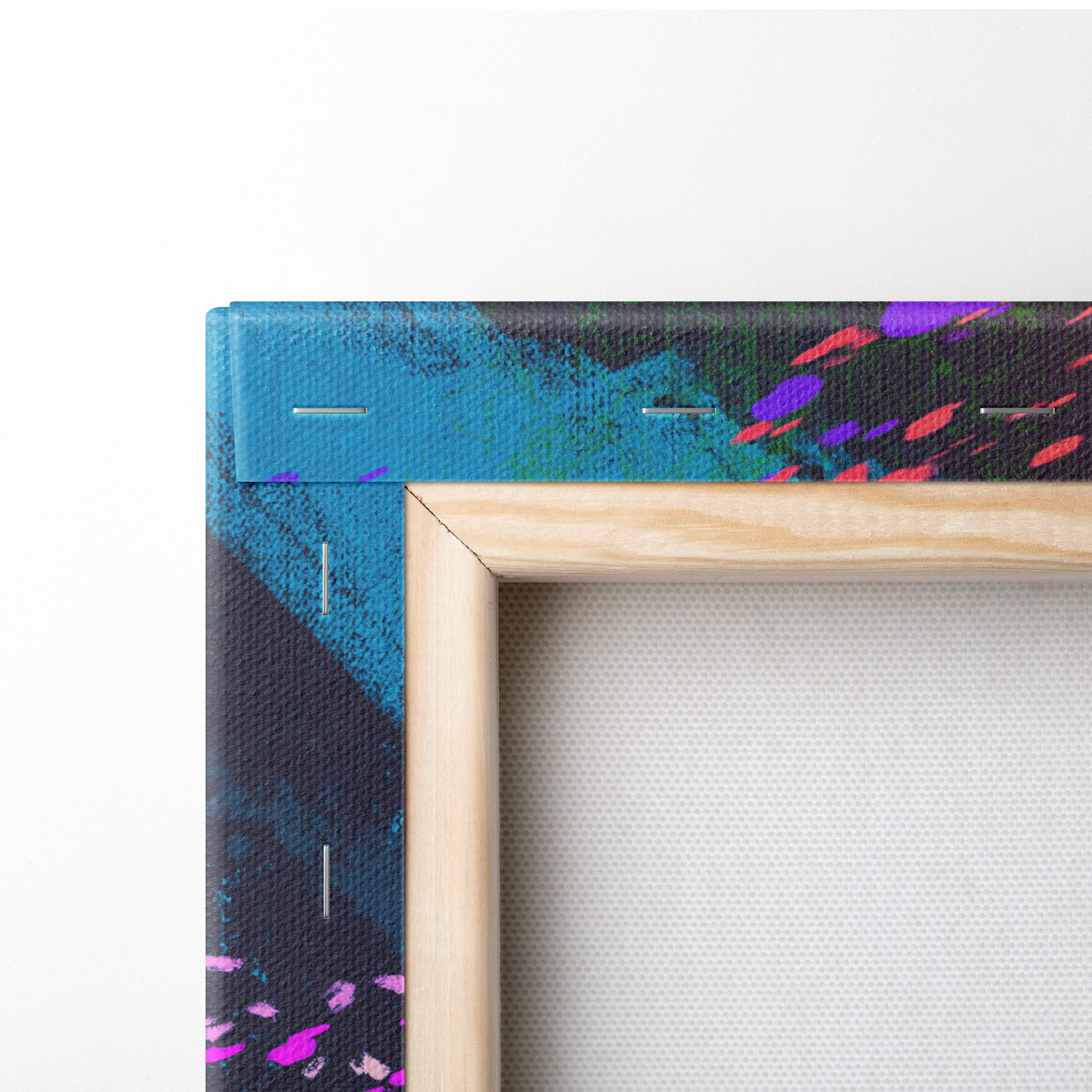 A vibrant abstract underwater canvas wall art with bold teal purple and pink splashes framed in light wood