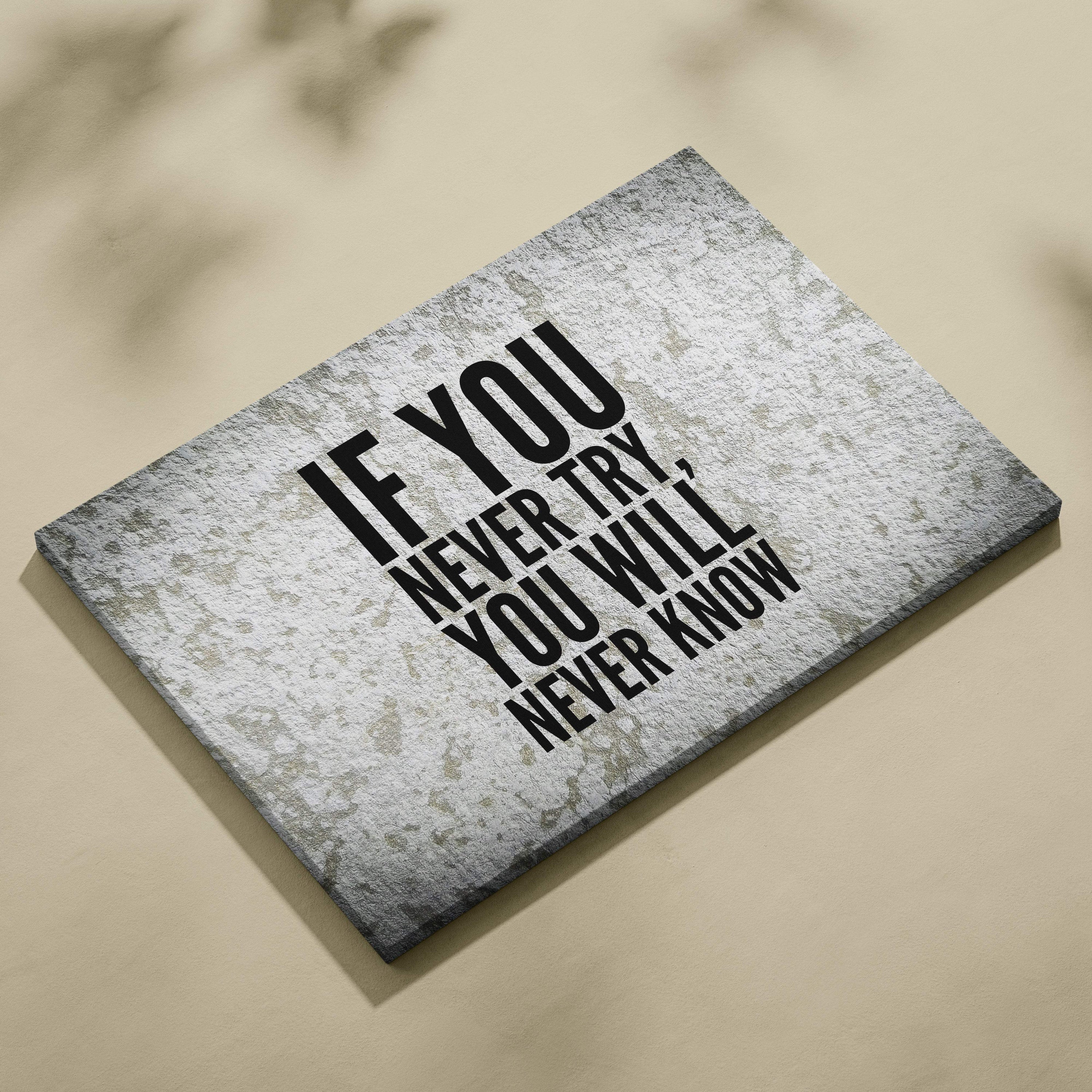 Gray textured canvas print with the motivational quote if you never try you will never know in bold black lettering