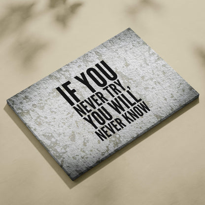Gray textured canvas print with the motivational quote if you never try you will never know in bold black lettering