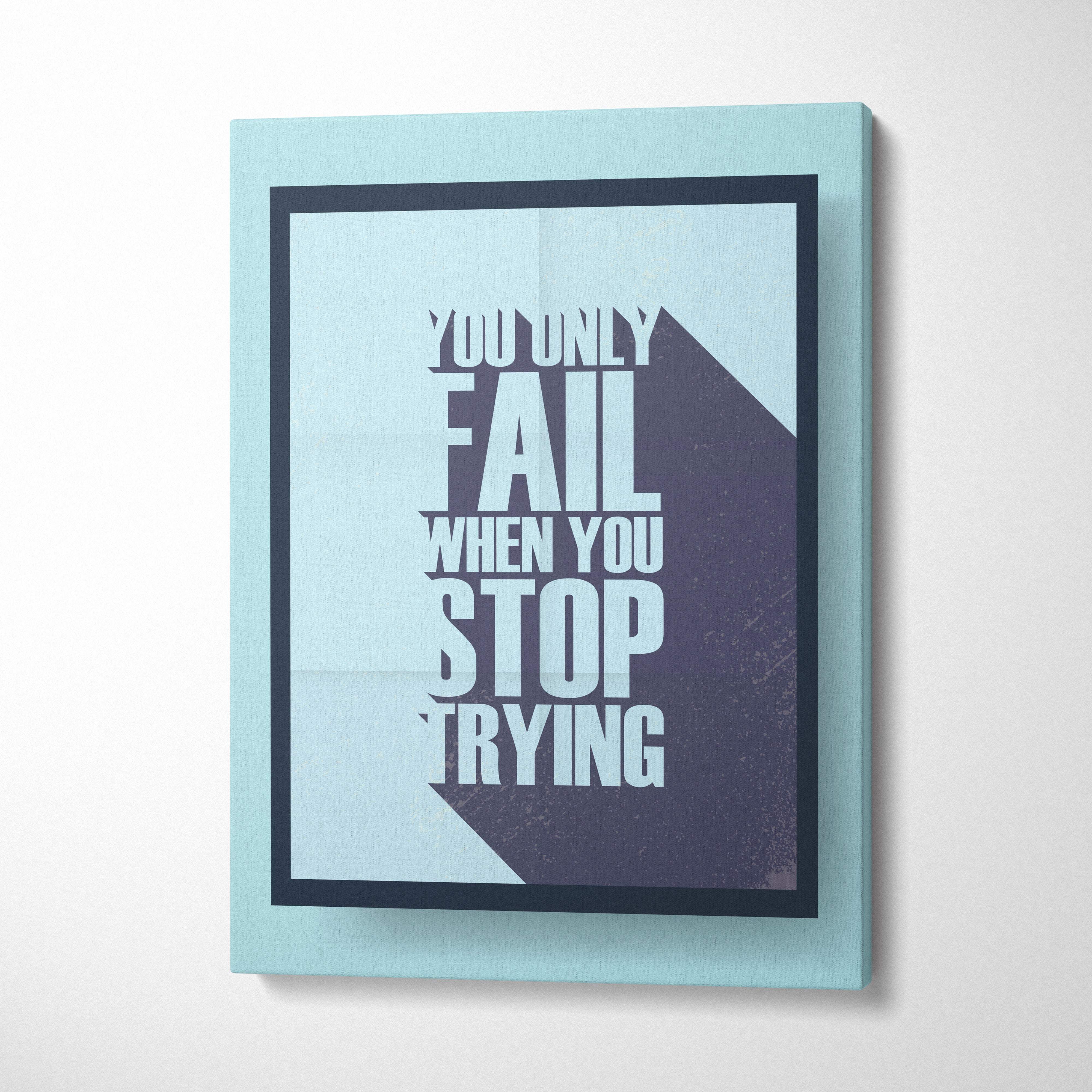 Light blue framed motivational wall art print with bold white text you only fail when you stop trying on split background