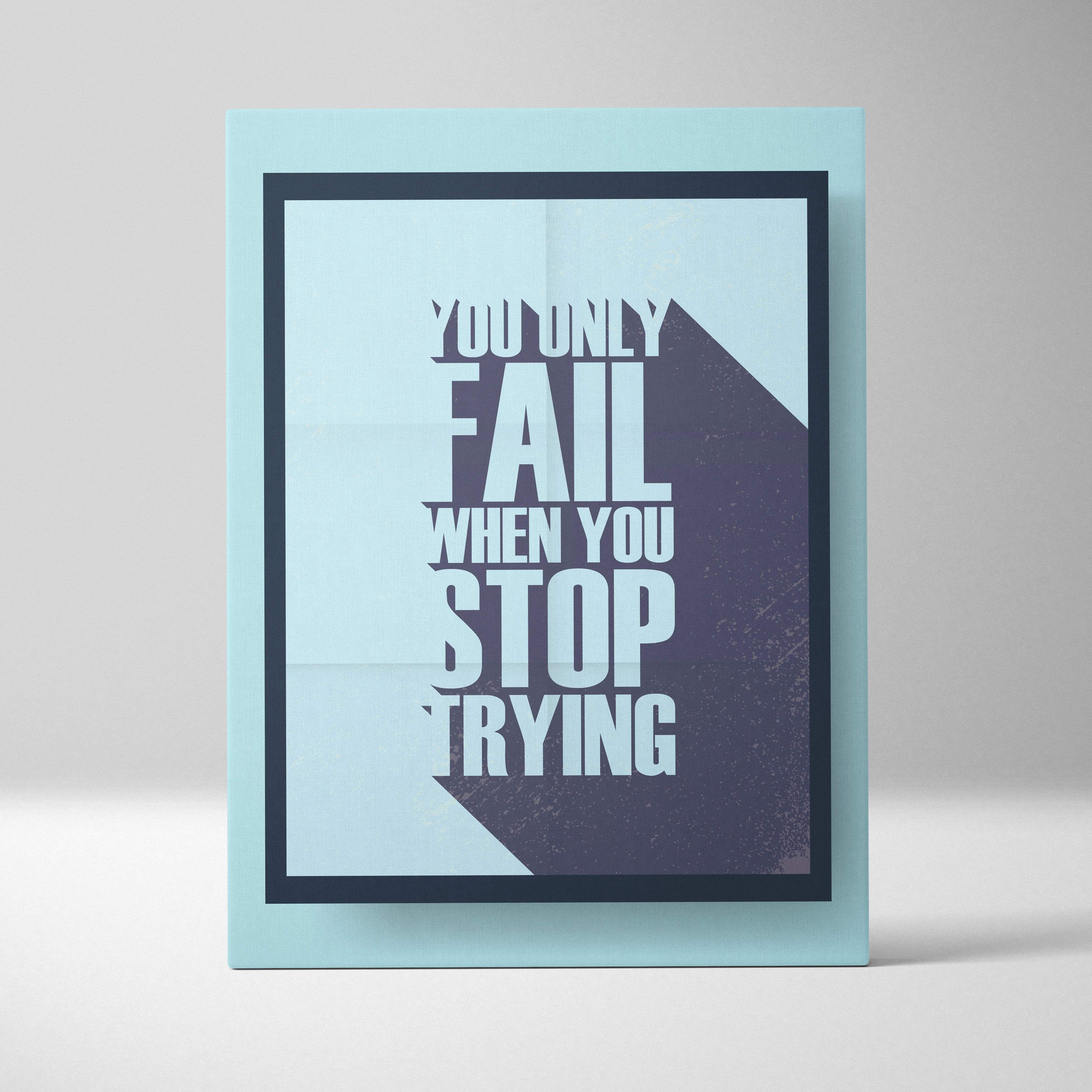 Minimalist motivational typography wall art print with you only fail when you stop trying quote in white on blue gray background in mint green frame