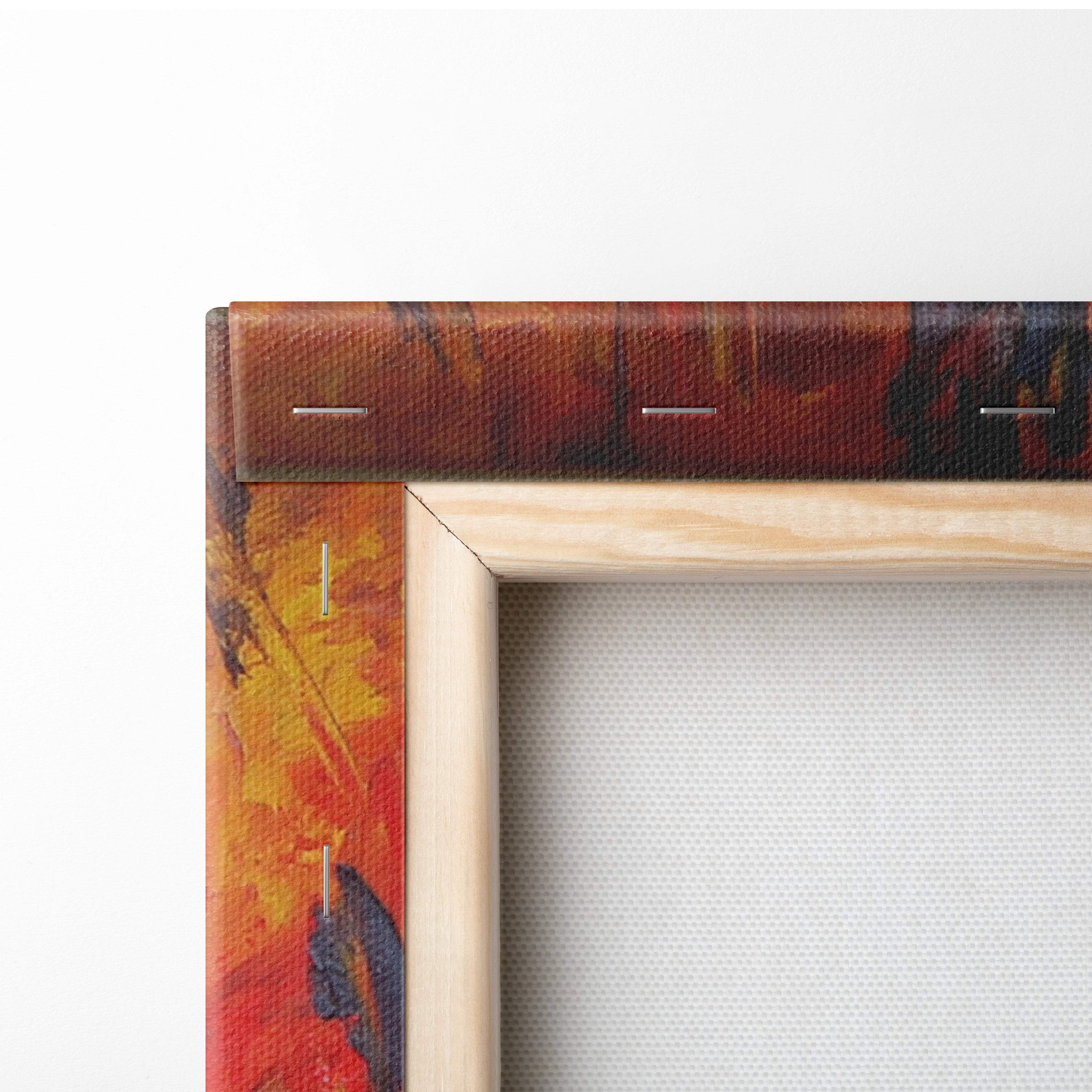 A wooden-framed canvas print featuring a textured abstract painting of bold red orange and brown autumn trees