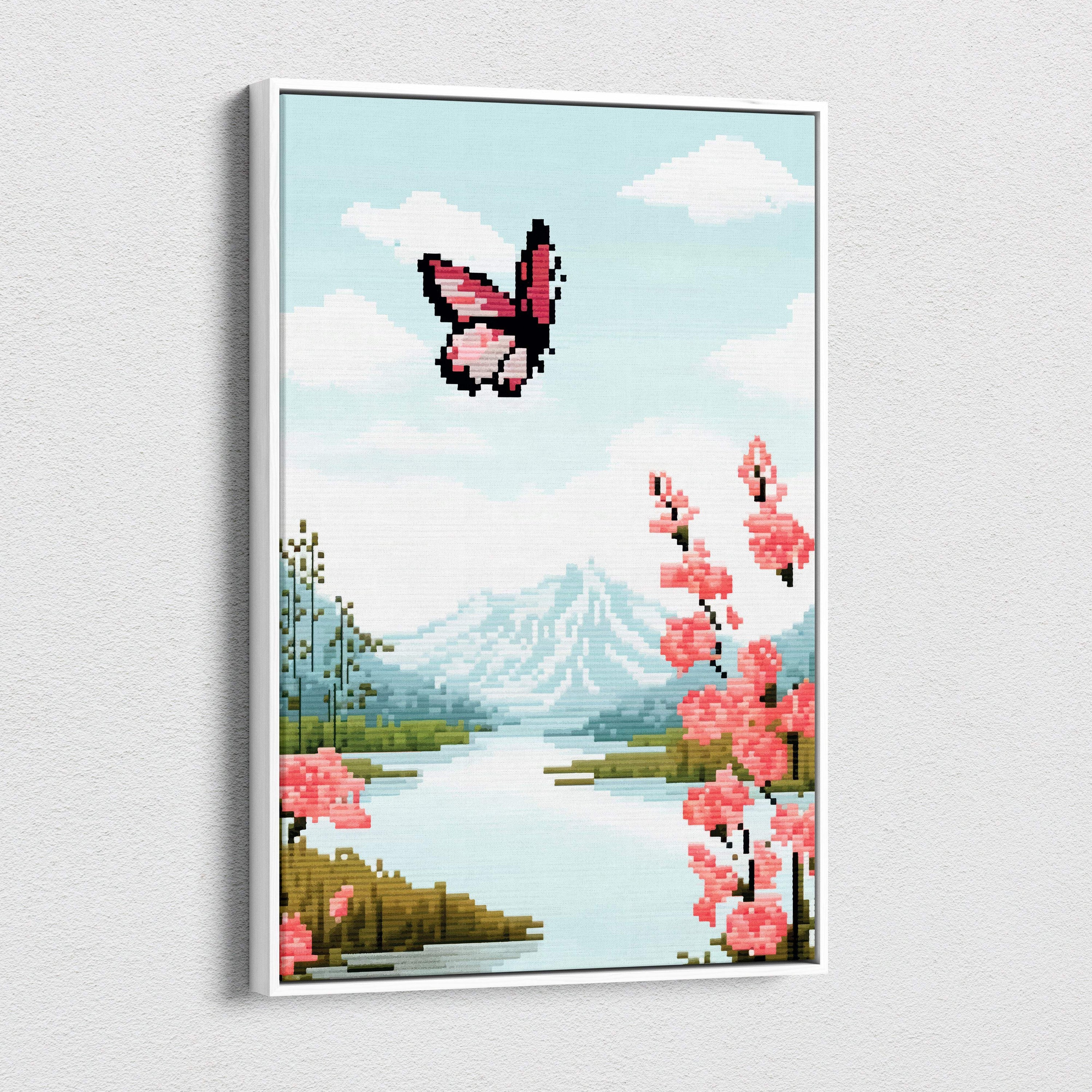 A framed pixel art canvas print featuring a pink butterfly flying above blossoming trees and mountains in a dreamy spring landscape