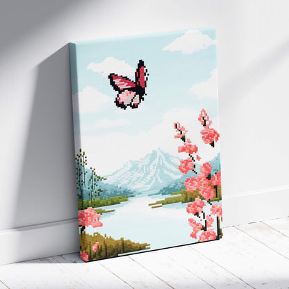 Butterfly lake pixel art canvas print with a pink butterfly over cherry blossoms and mountains in vibrant colors