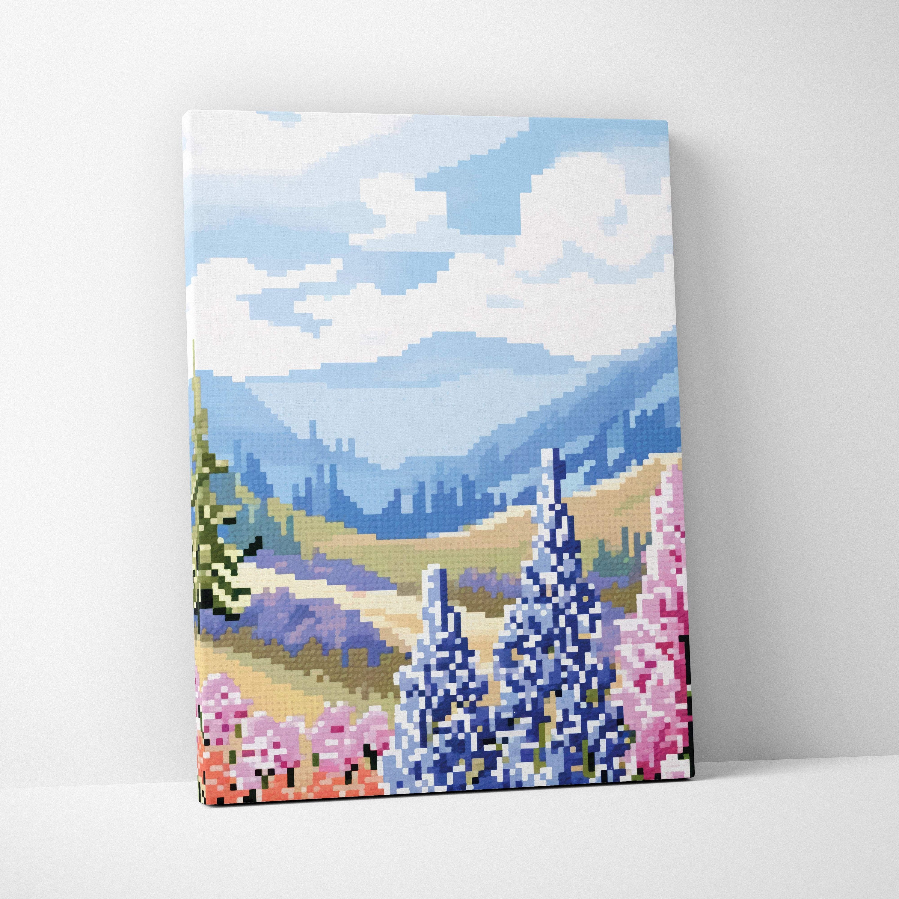 Wildflower mountain pixel art canvas print featuring rolling hills, purple and pink flowers under a blue sky