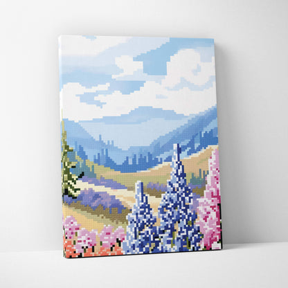 Wildflower mountain pixel art canvas print featuring rolling hills, purple and pink flowers under a blue sky