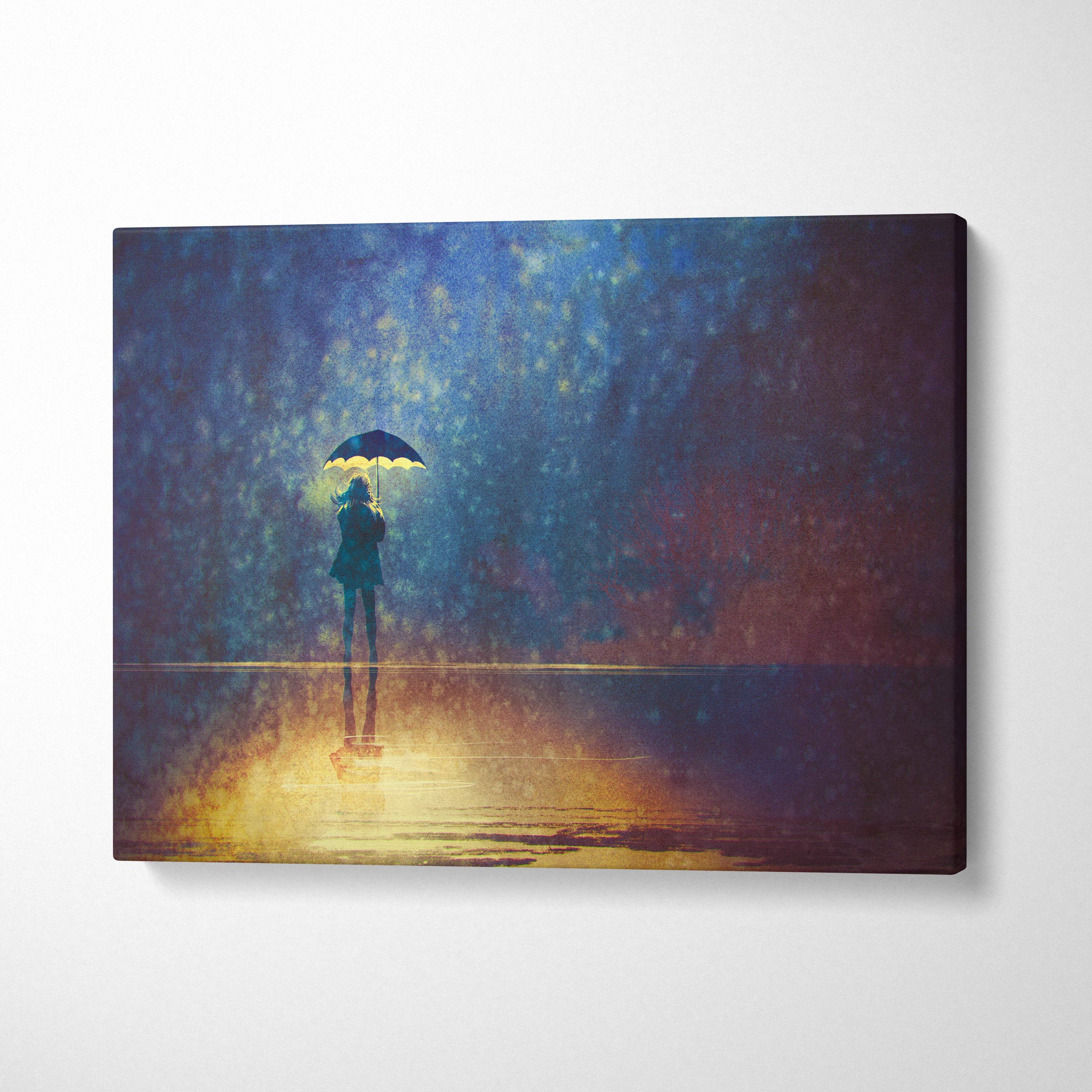 A rectangular canvas print of a solitary figure with umbrella under a moody blue and gold rainy night sky
