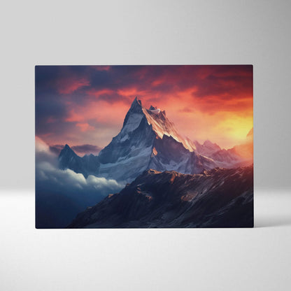 Canvas print of sunset peaks over snowy alpine ridge in orange blue mood