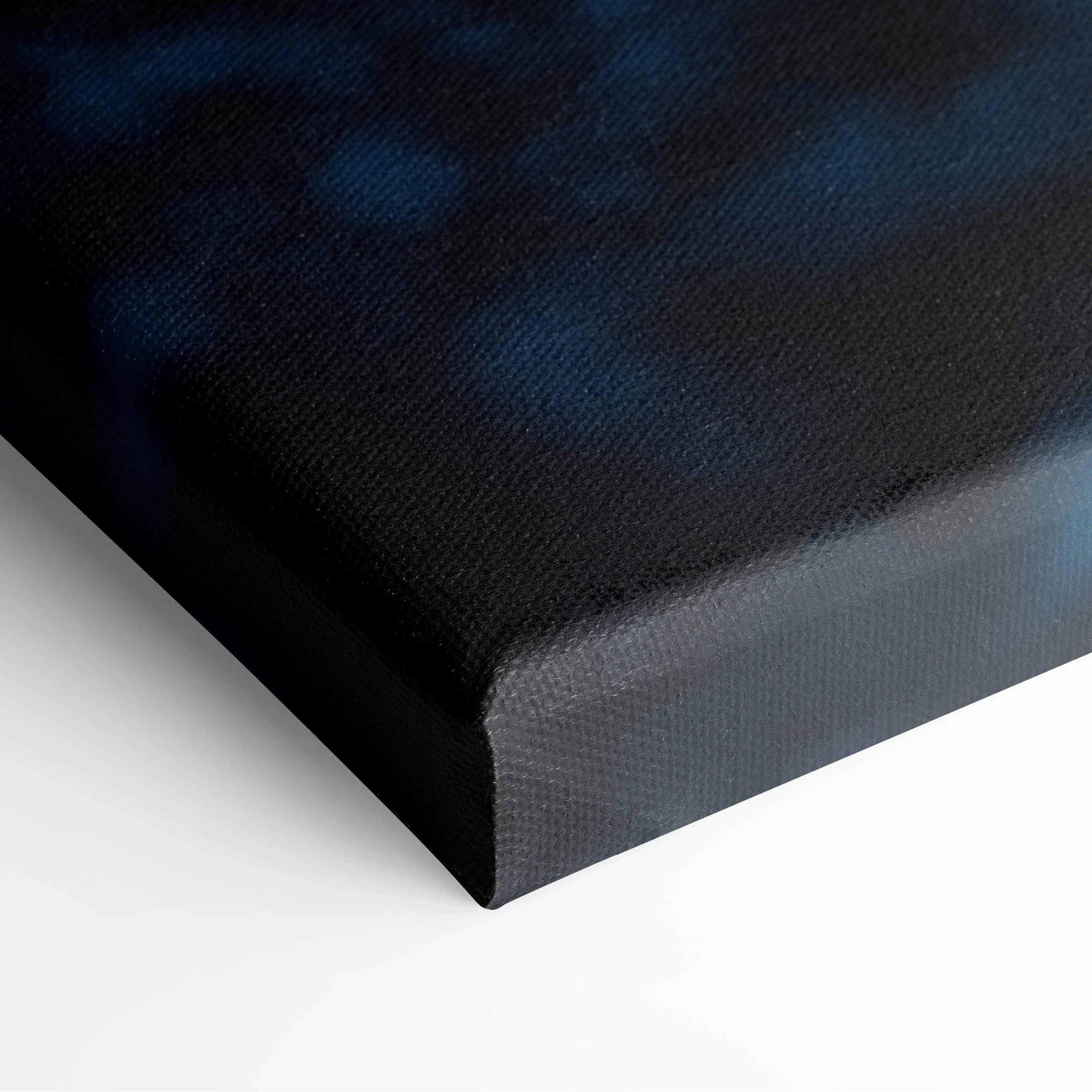 Close-up of black and dark blue textured canvas art corner on wall art print.