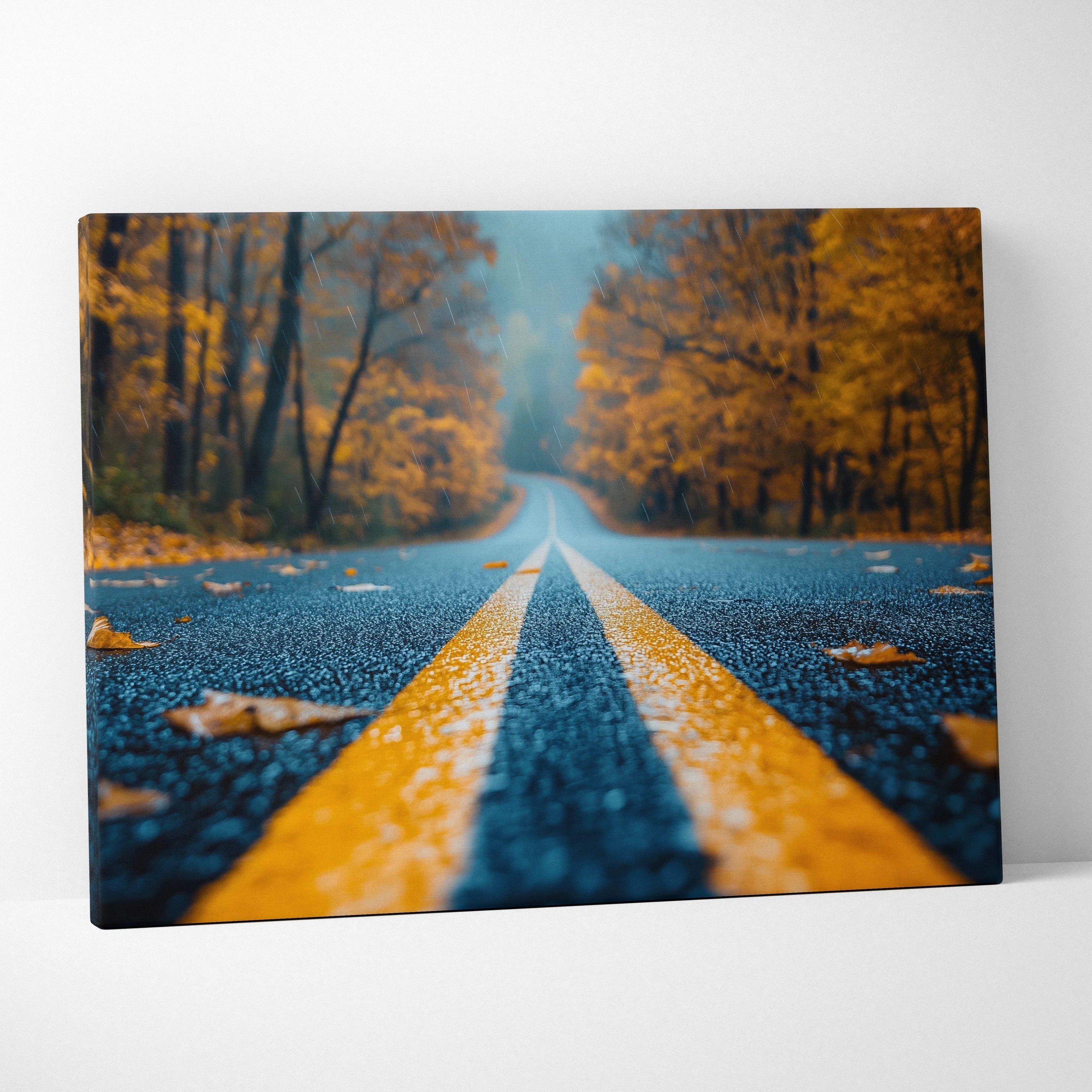 Canvas wall art featuring vibrant autumn trees with orange leaves along a misty forest road.