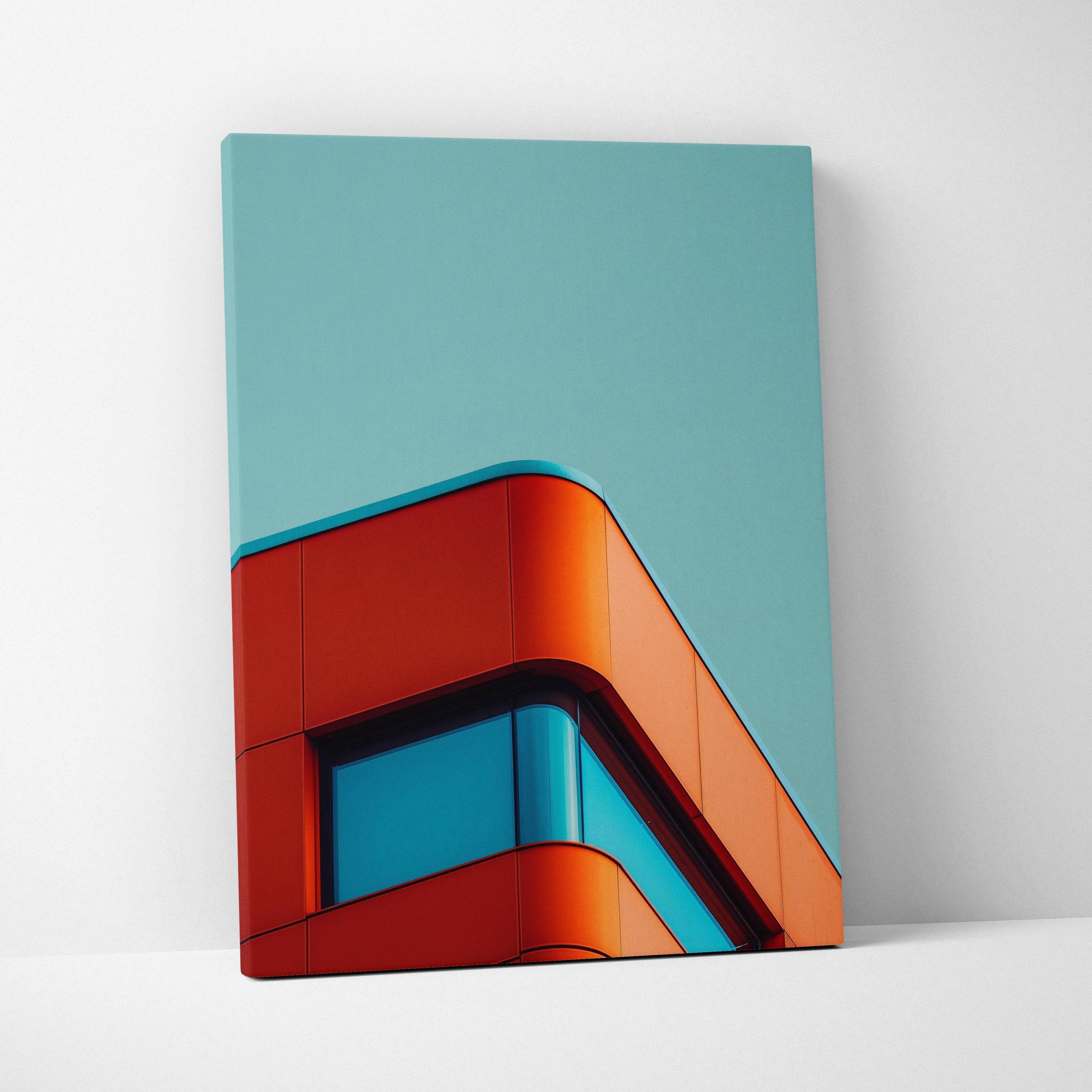 Vertical canvas wall art featuring modern building with bold orange and blue geometric lines against a teal sky background.