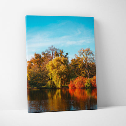Autumn nature landscape with colorful trees reflected in water on vertical canvas wall art.