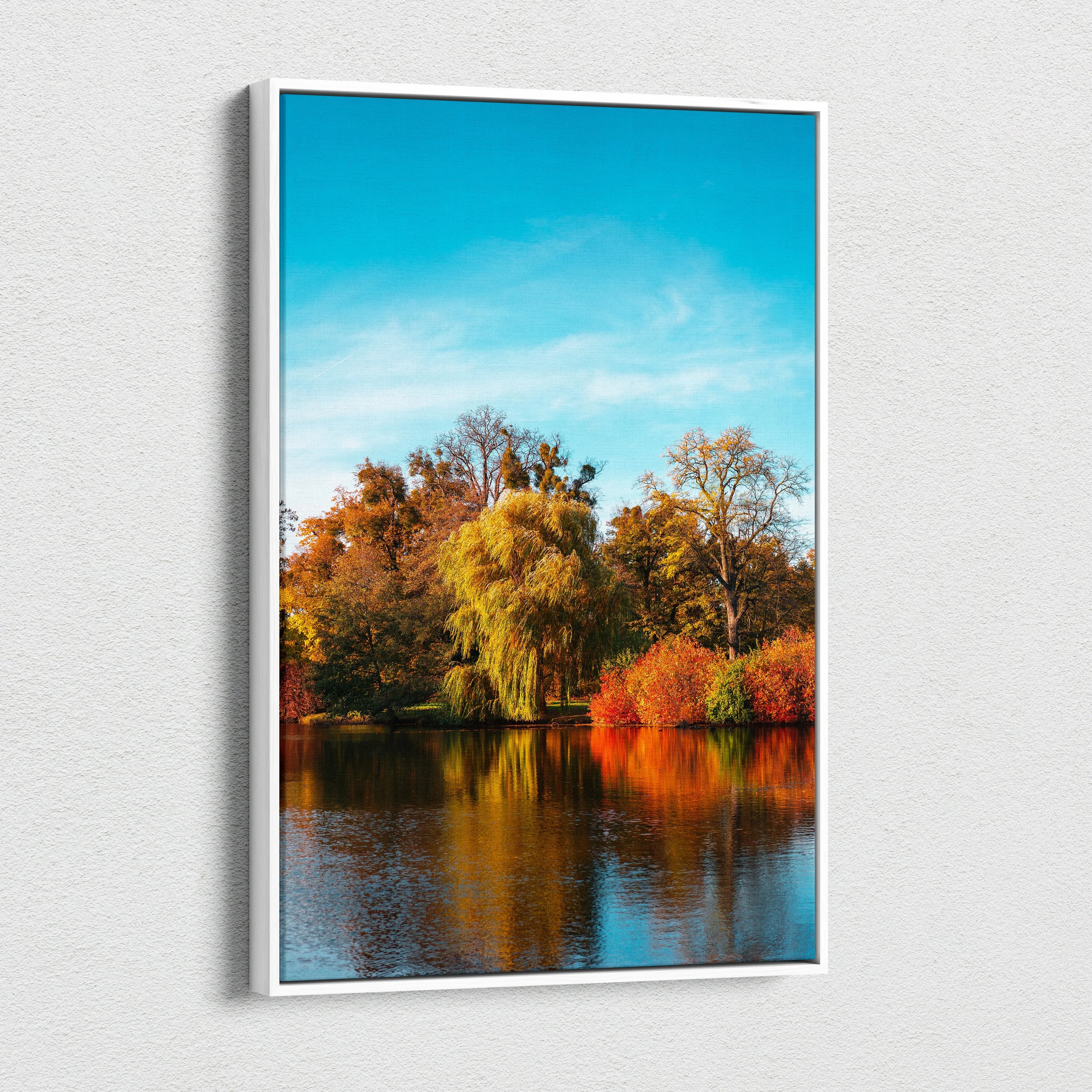 Autumn nature scene canvas art with colorful trees reflected in calm lake, vertical wall art.