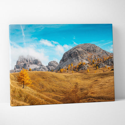 Autumn landscape canvas art with golden trees and rocky mountains under a blue sky wall art.