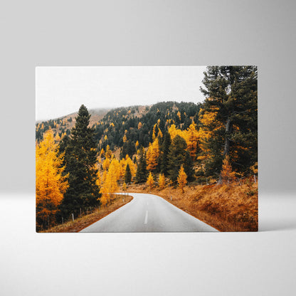 Autumn winding road through vibrant golden trees canvas art wall decor.