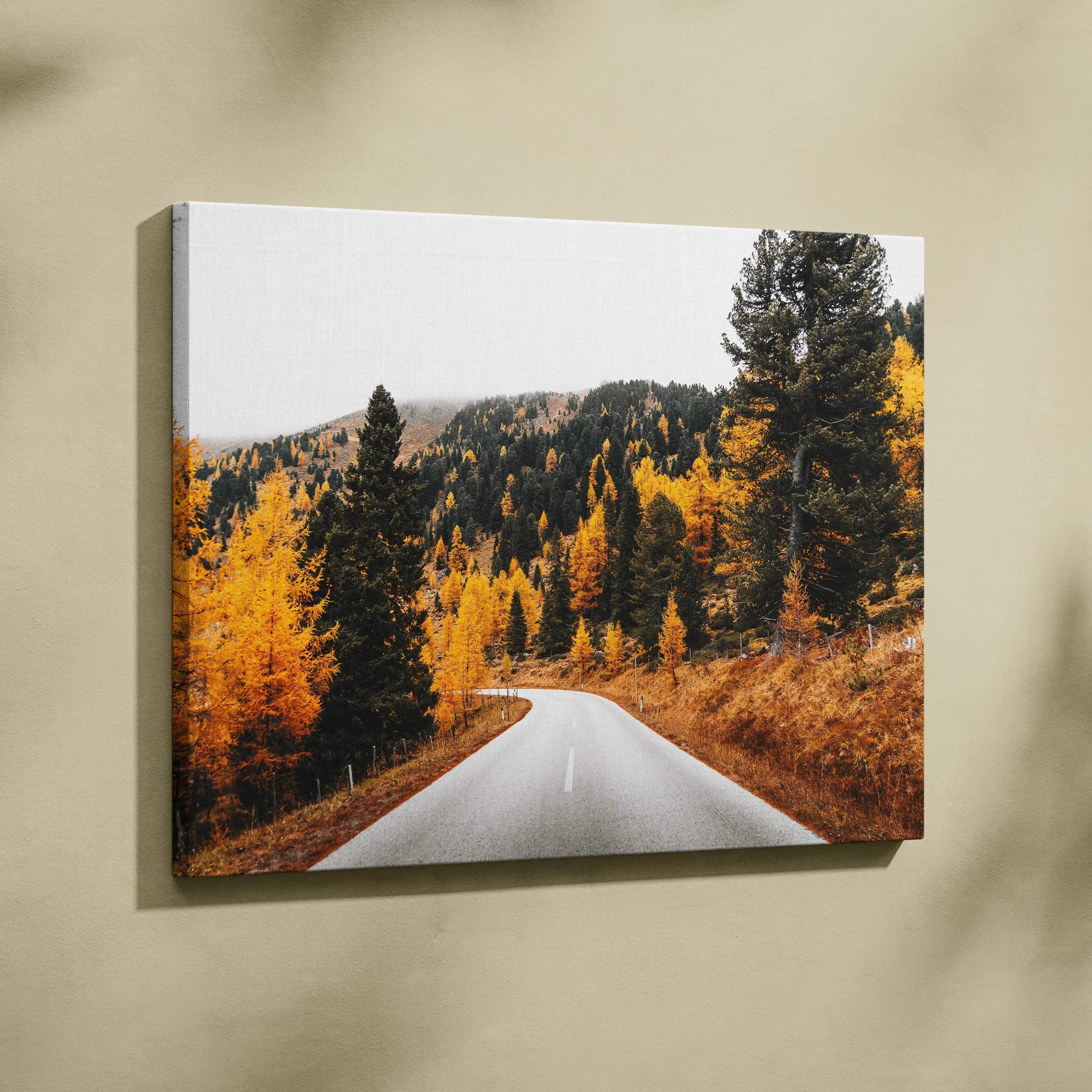 Canvas art of winding road through vibrant autumn forest with golden trees, wall art decor.