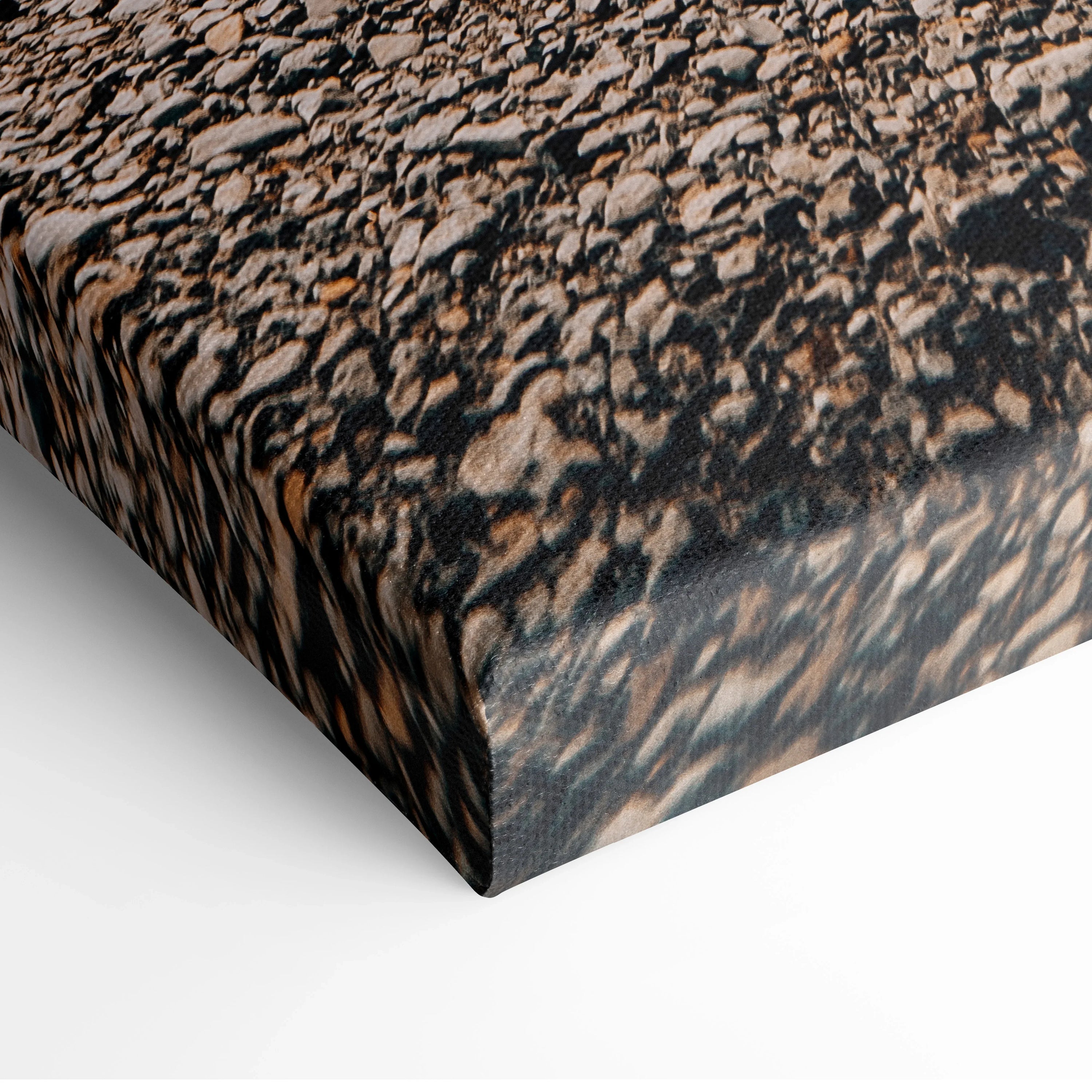 Close-up of textured canvas wall art with detailed black and brown nature-inspired pattern.