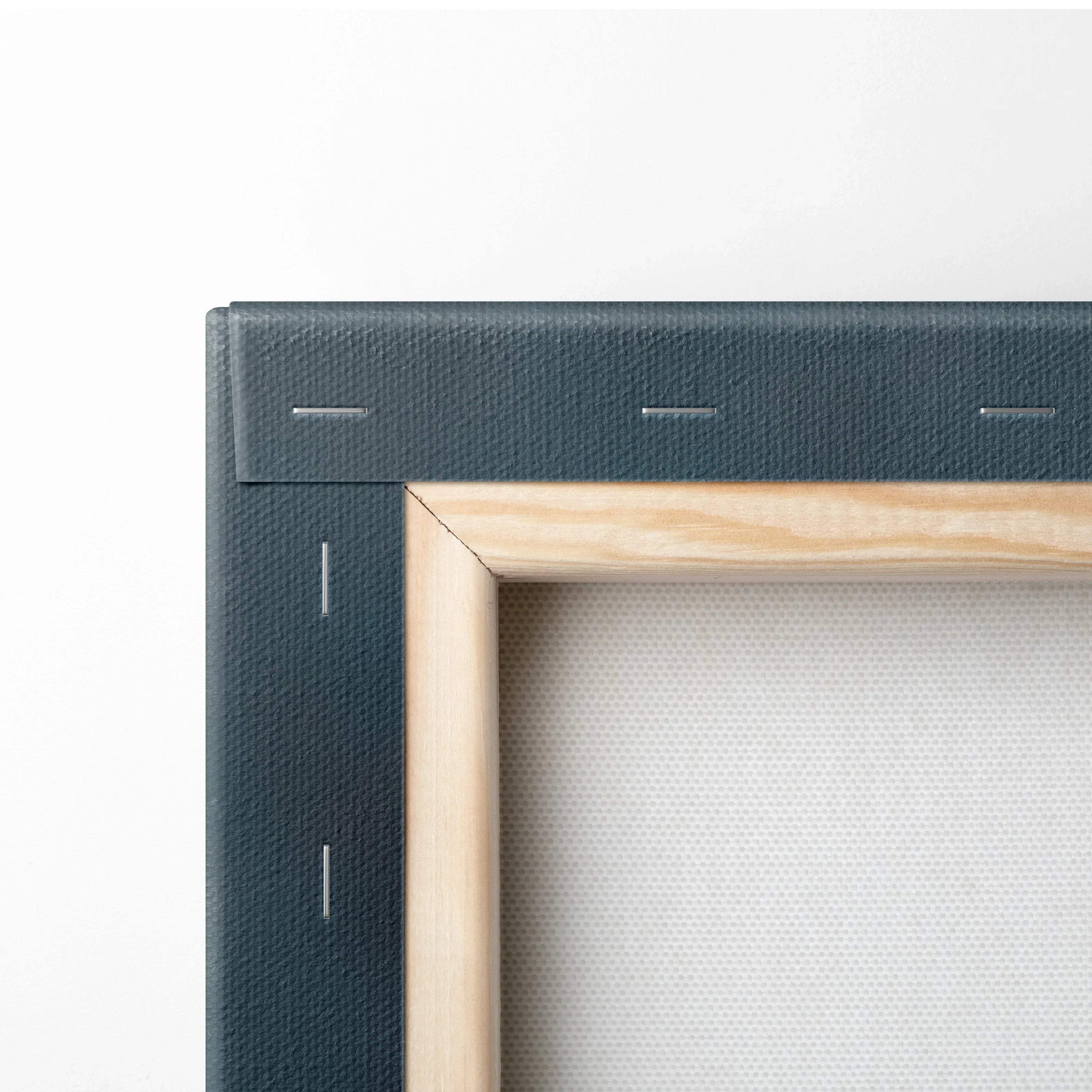 Close-up of wooden frame and canvas back showing staples and texture of canvas art wall decor.