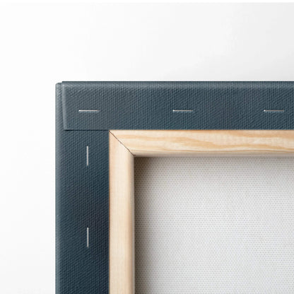 Close-up of wooden frame and canvas back showing staples and texture of canvas art wall decor.