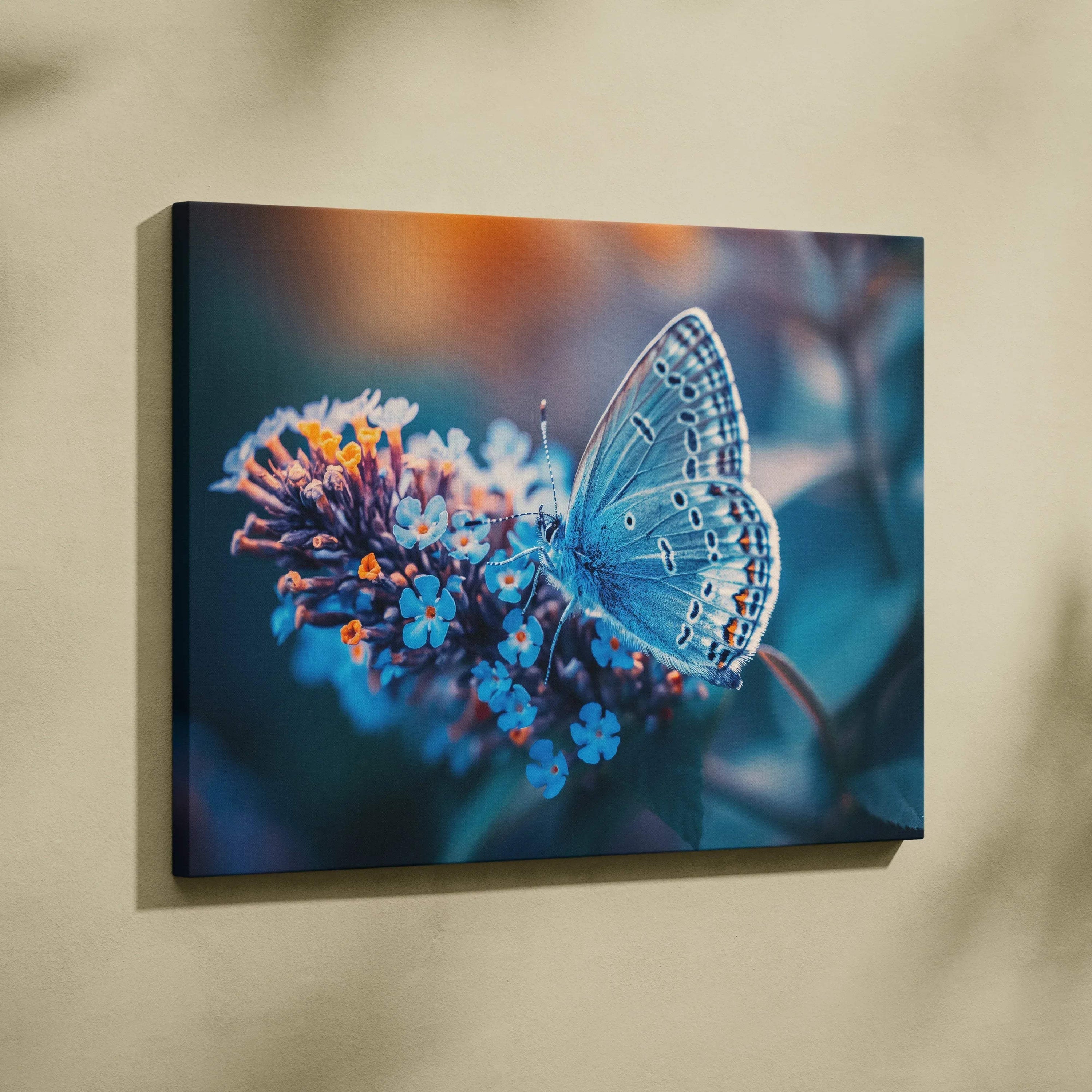 Blue butterfly canvas wall art on flowers in calming blue tones