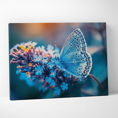 Canvas wall art of blue butterfly on vibrant flowers in calming blue tones