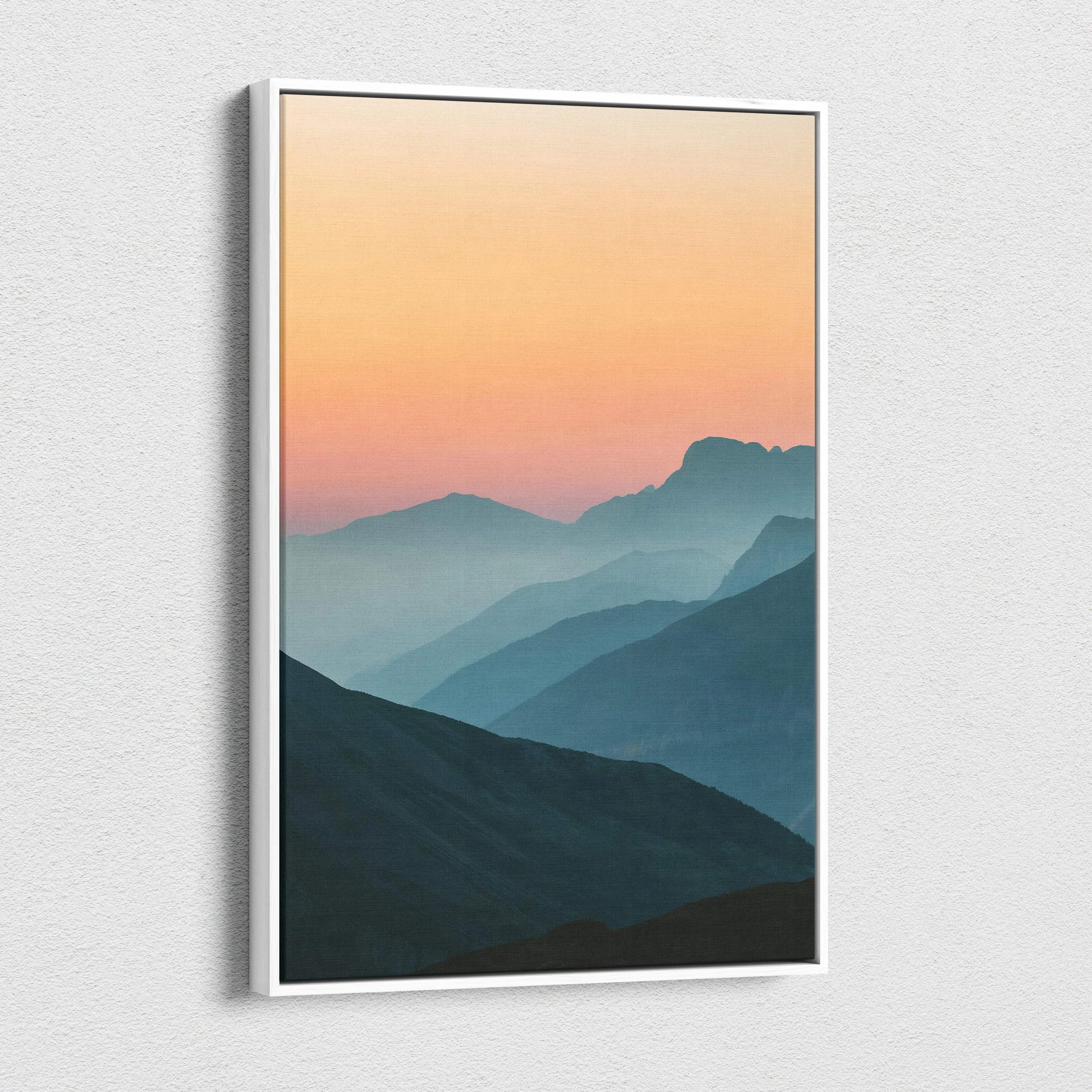 Minimalist canvas wall art of serene mountain sunset peaks over layered blues and peach sky