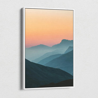 Minimalist canvas wall art of serene mountain sunset peaks over layered blues and peach sky