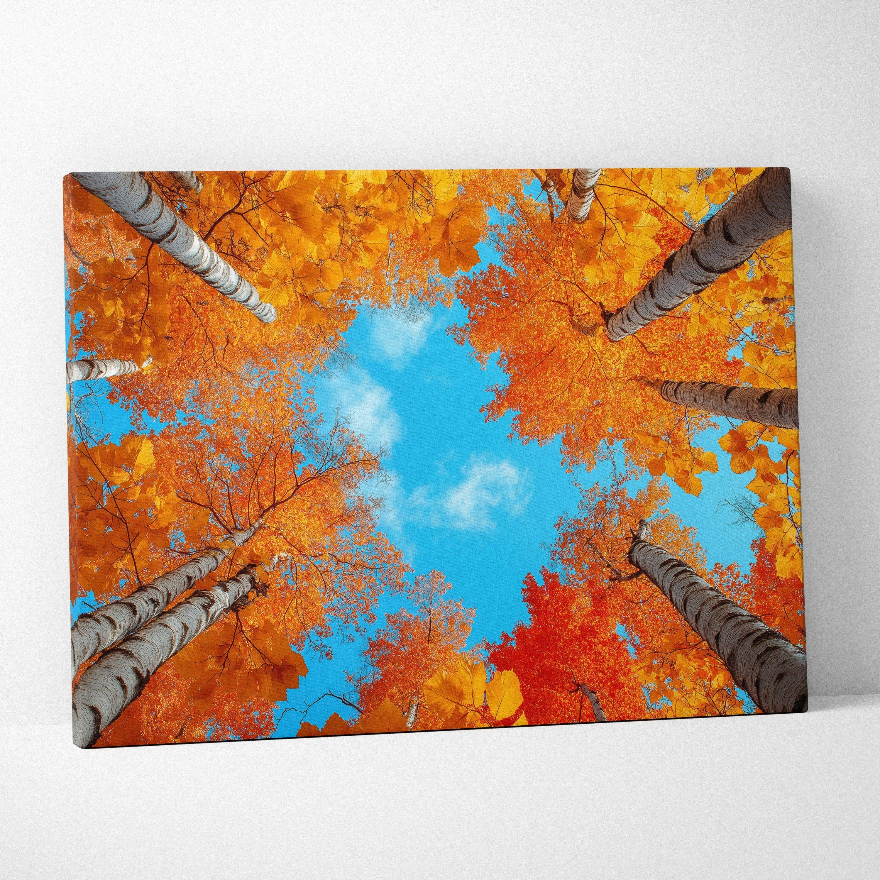 Canvas art featuring vibrant golden and orange autumn foliage against a bright blue sky, wall art with serene nature scene.