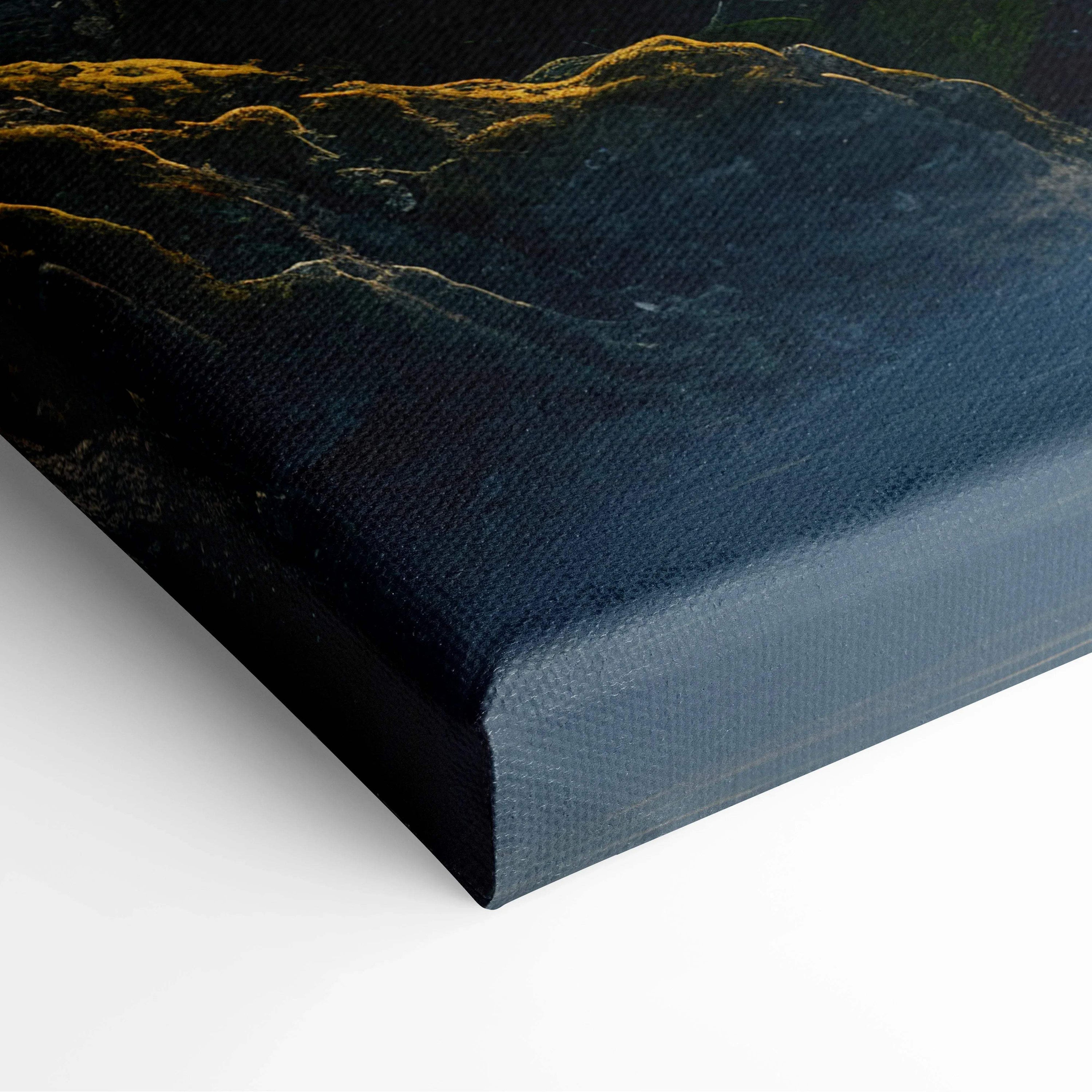 Close-up of textured canvas wall art corner with dark forest and waterfall design for living room decor.