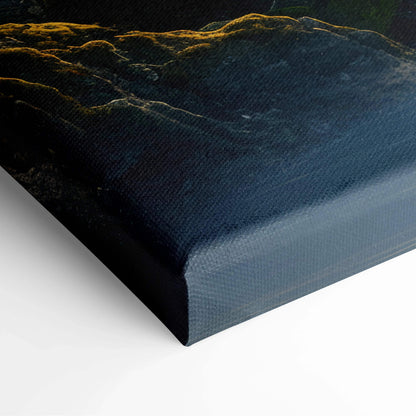 Close-up of textured canvas wall art corner with dark forest and waterfall design for living room decor.