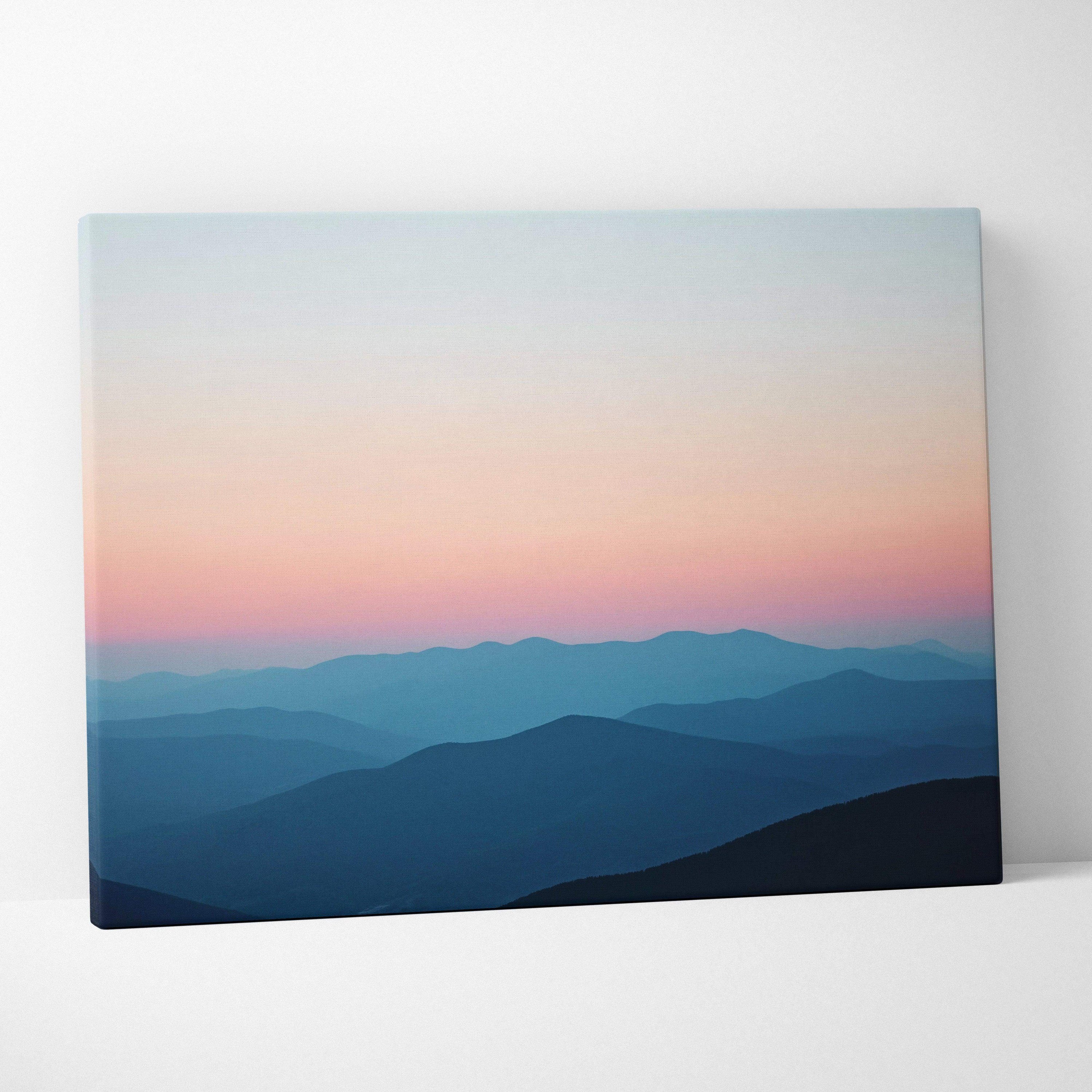 Canvas print of serene mountain landscape at dusk with pink blue gradient sky