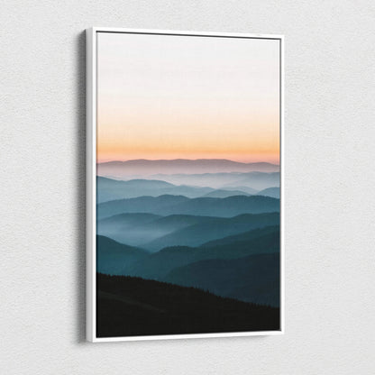 Minimalist canvas print of layered mountains under peach to blue sunset gradient sky