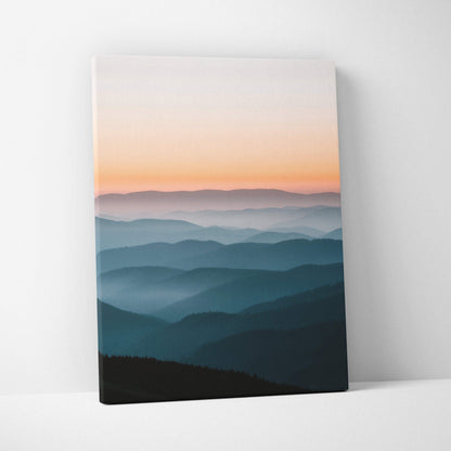 Canvas wall art of serene mountain ridge at sunset in calm peach blues