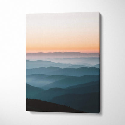 Canvas wall art of serene mountain ridge at sunset in calm peach blues