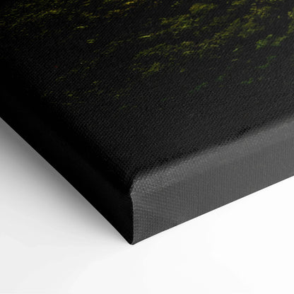 Black-wrapped digital canvas print with subtle green and yellow architectural design details on textured surface.