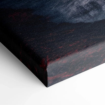 Close-up of dark textured canvas art with subtle red and black tones on wrapped edge wall decor.