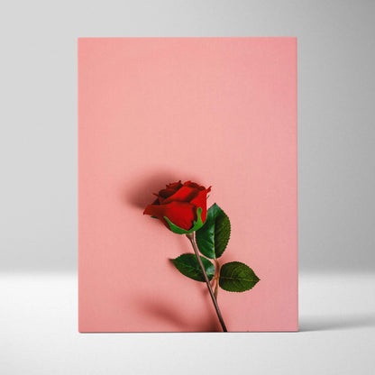 Vibrant red rose canvas wall art on pastel pink background