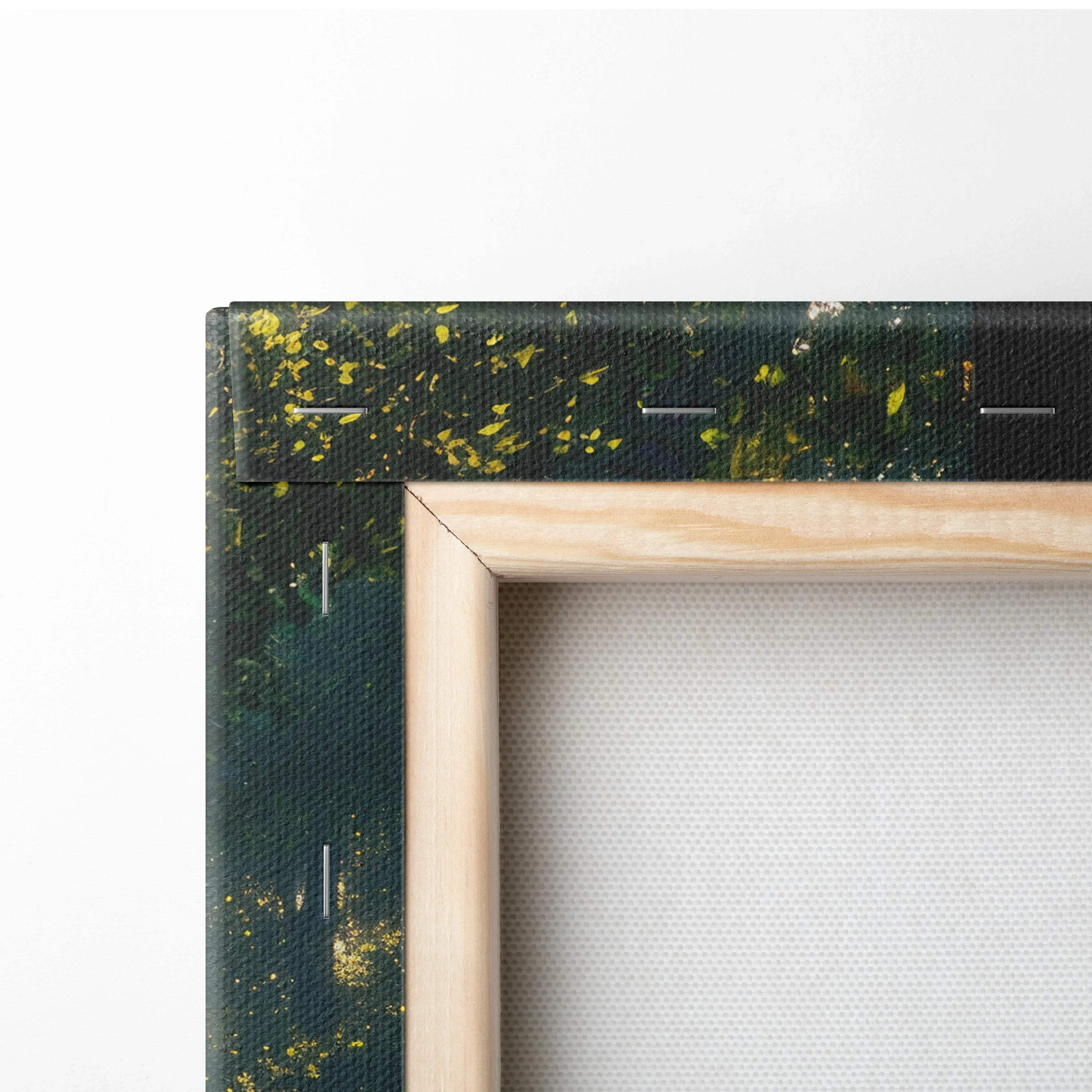 Close-up of natural wooden frame corner on canvas wall art with dark green and yellow forest sunset decor.