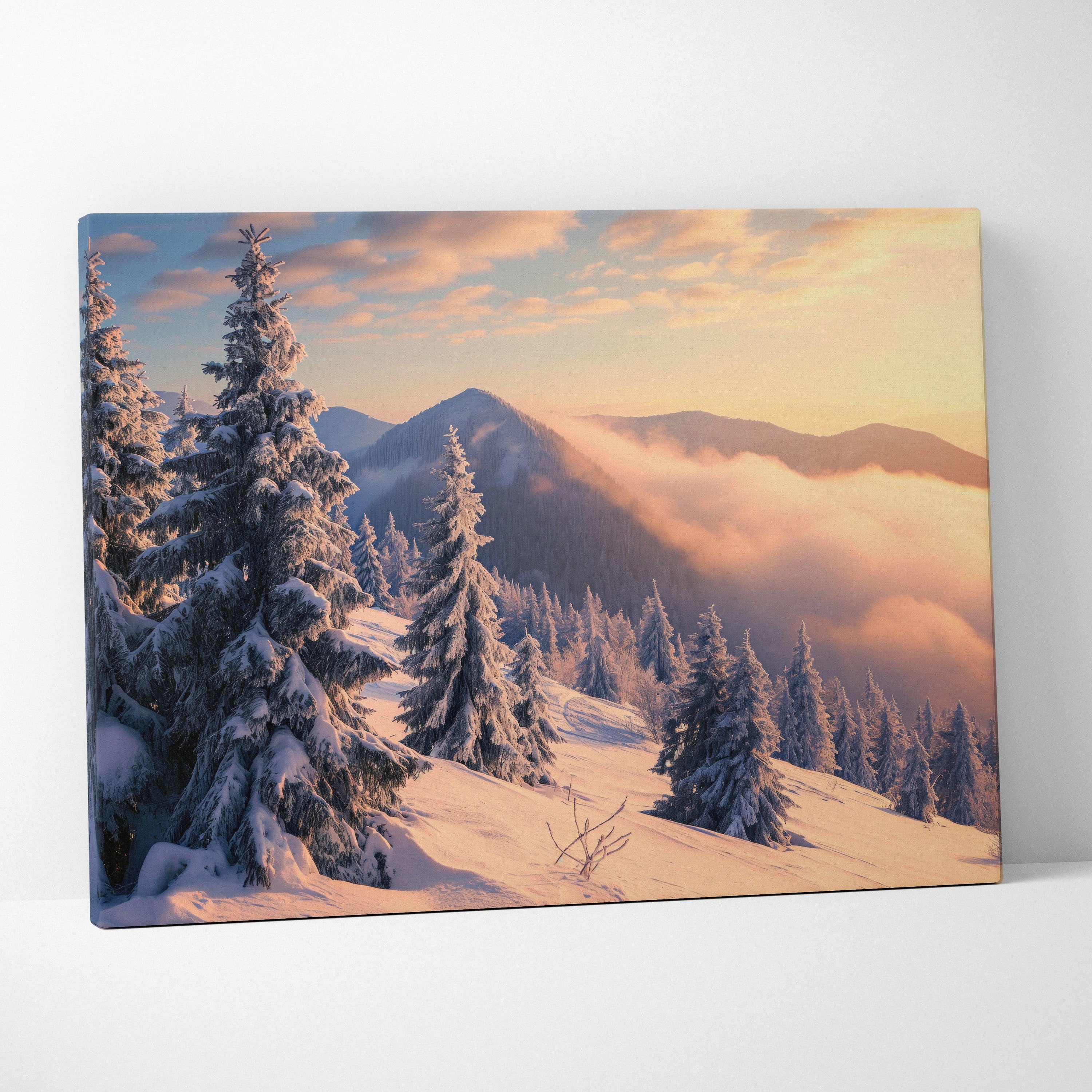 Canvas wall art featuring a snowy mountain landscape at sunset with warm golden sky and frosted pine trees.