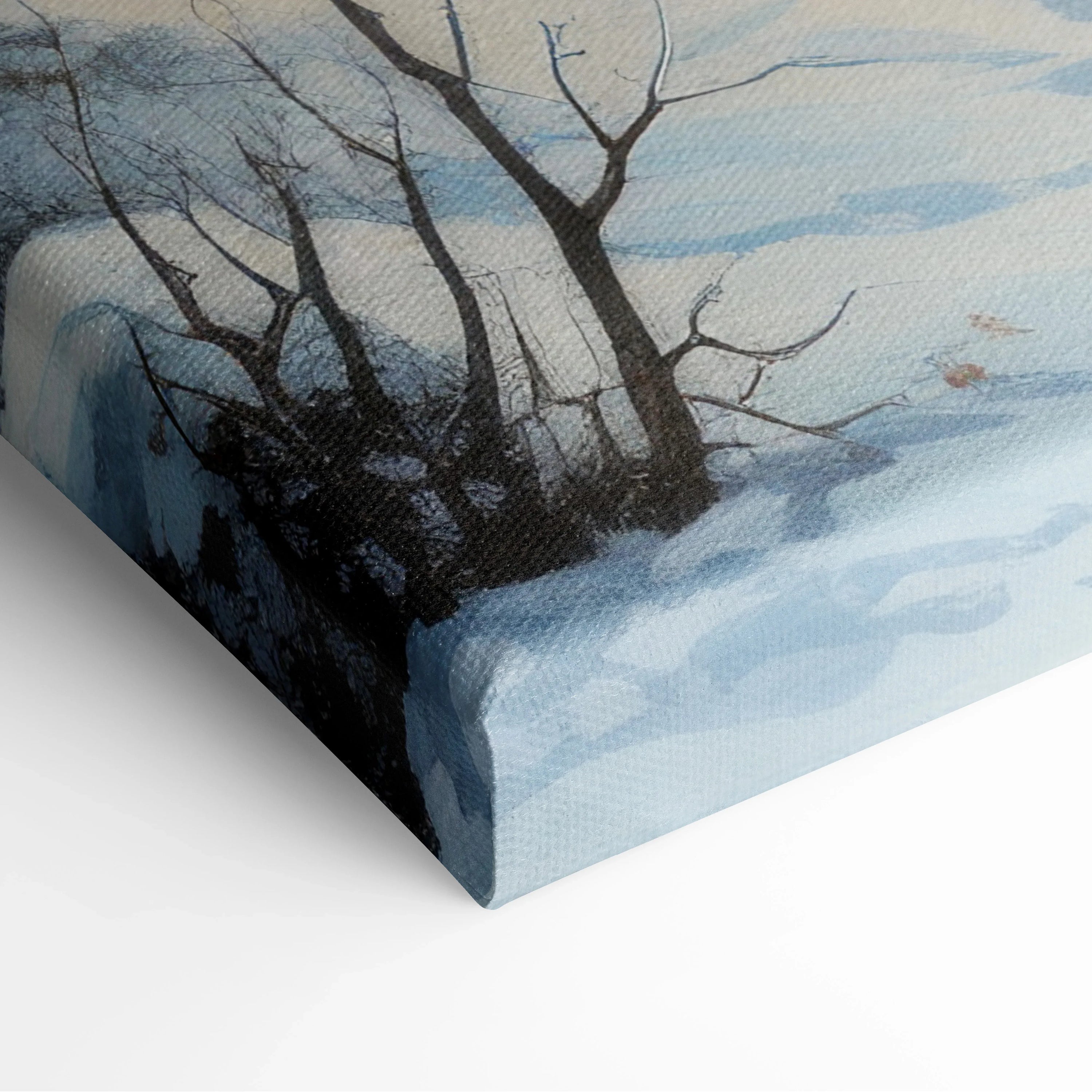 Canvas wall art depicting a snowy winter landscape with bare trees and soft blue-gray tones.