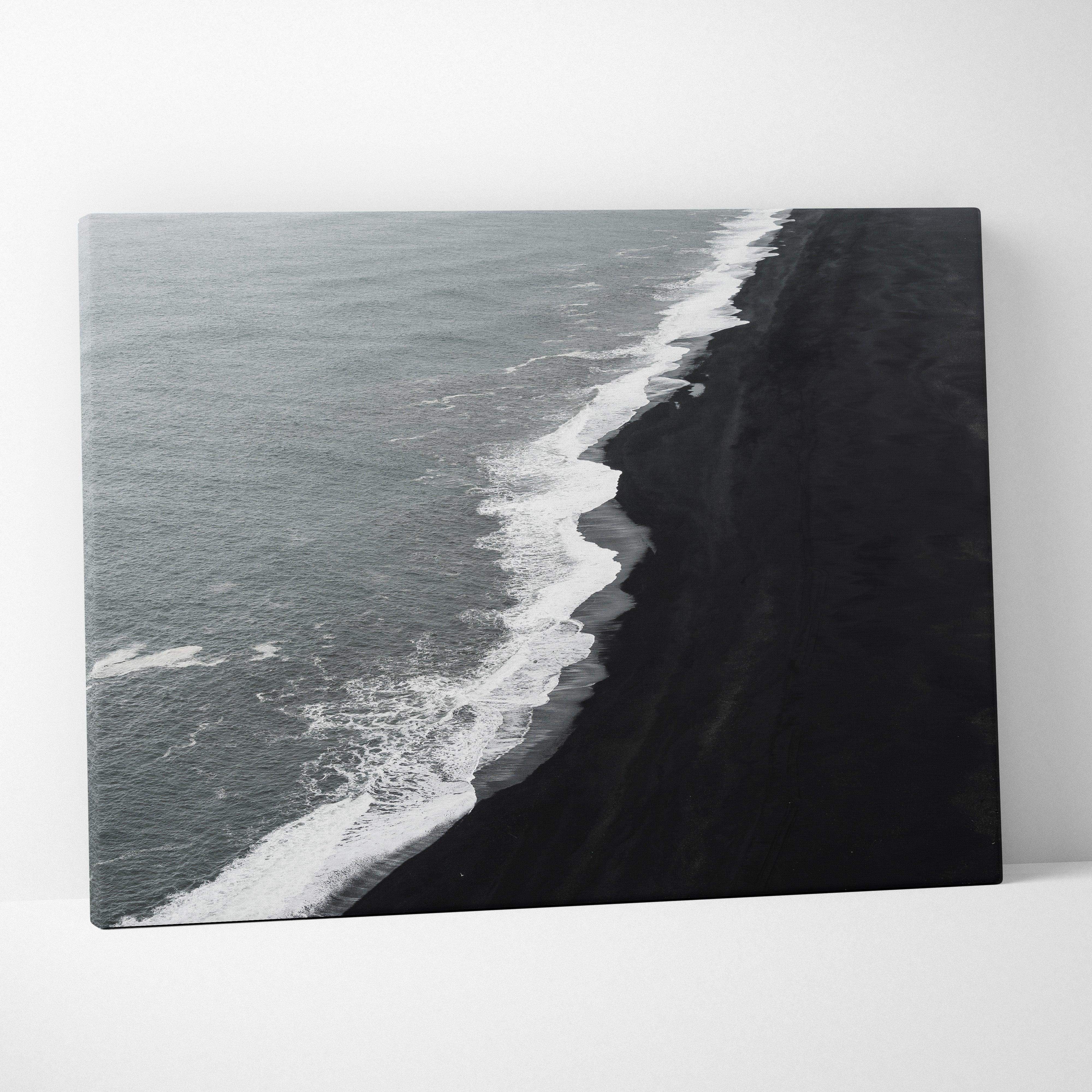 Monochrome canvas print of Icelandic black sand beach waves