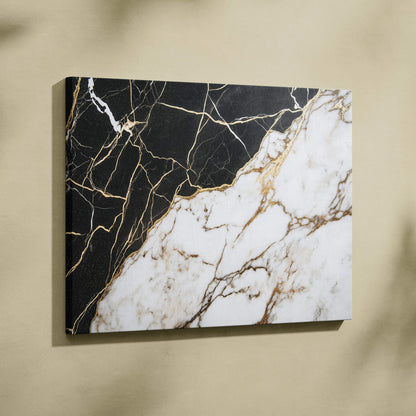 Abstract canvas wall art with black, white, and gold marble-like veins on textured surface.