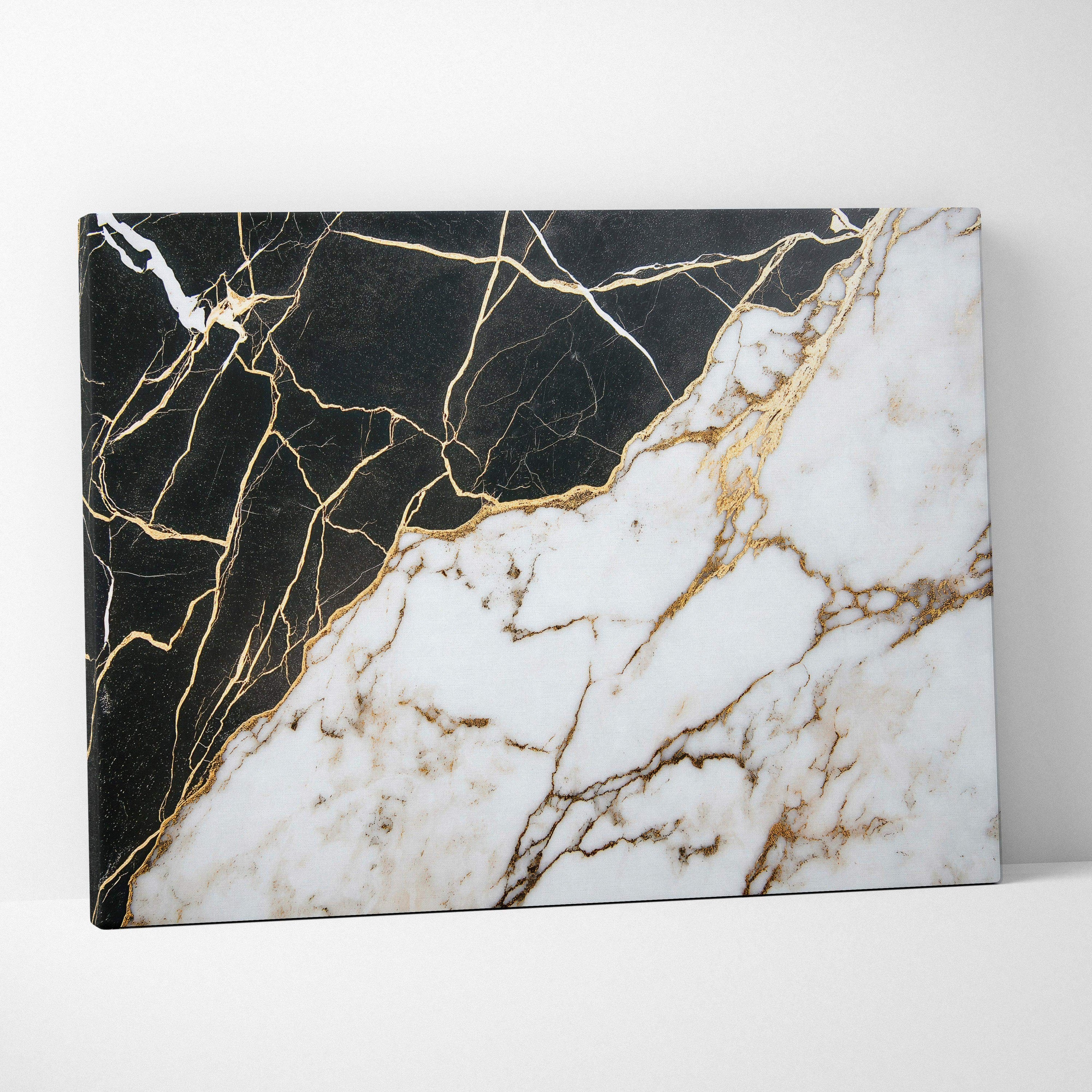 Abstract black and white marble pattern with gold veining on canvas wall art.