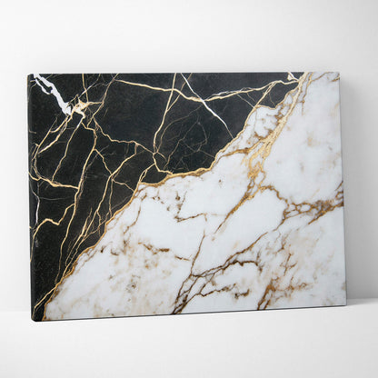 Abstract black and white marble pattern with gold veining on canvas wall art.