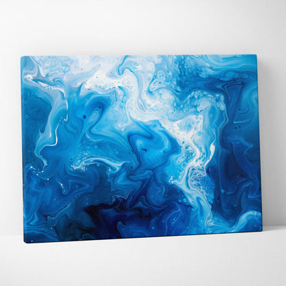 Abstract blue and white swirling patterns on a rectangular canvas wall art print.